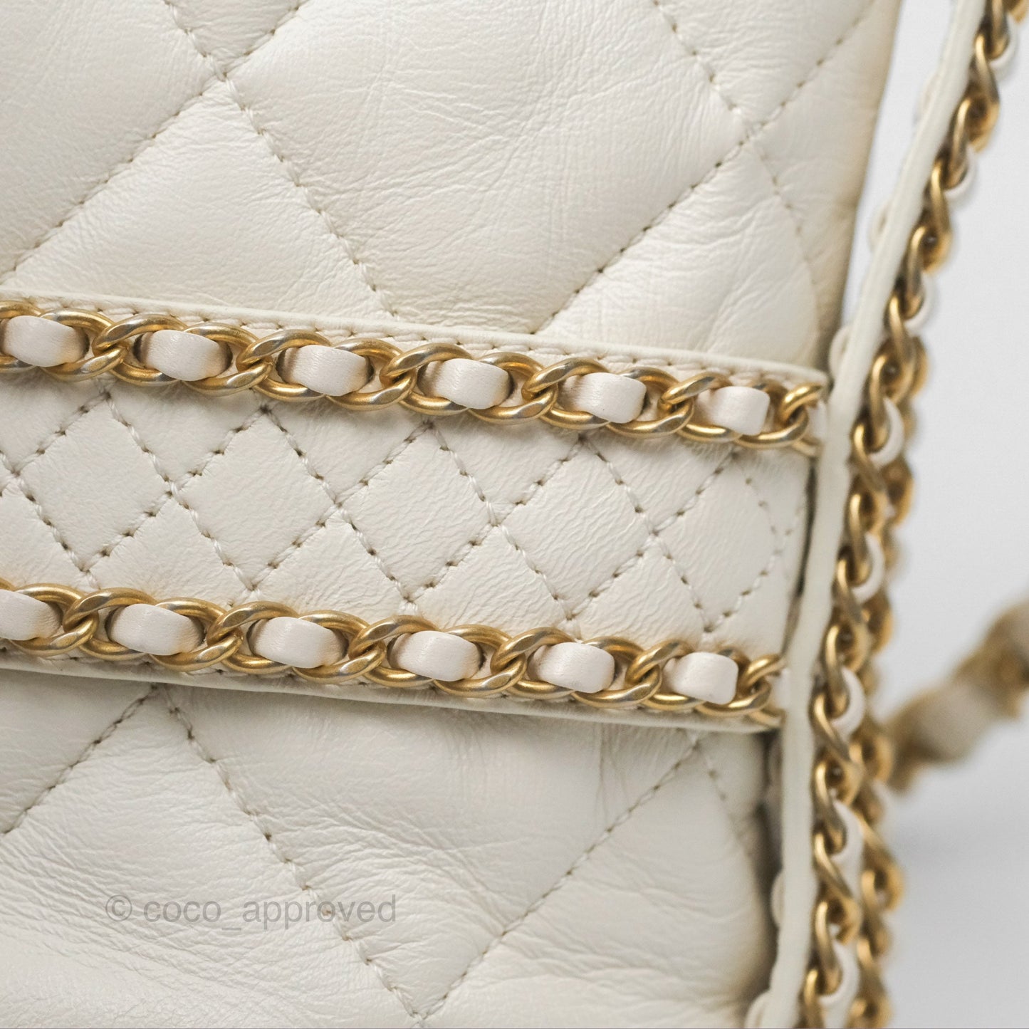 Chanel Quilted Drawstring Bucket Bag Ivory Lambskin Aged Gold Hardware