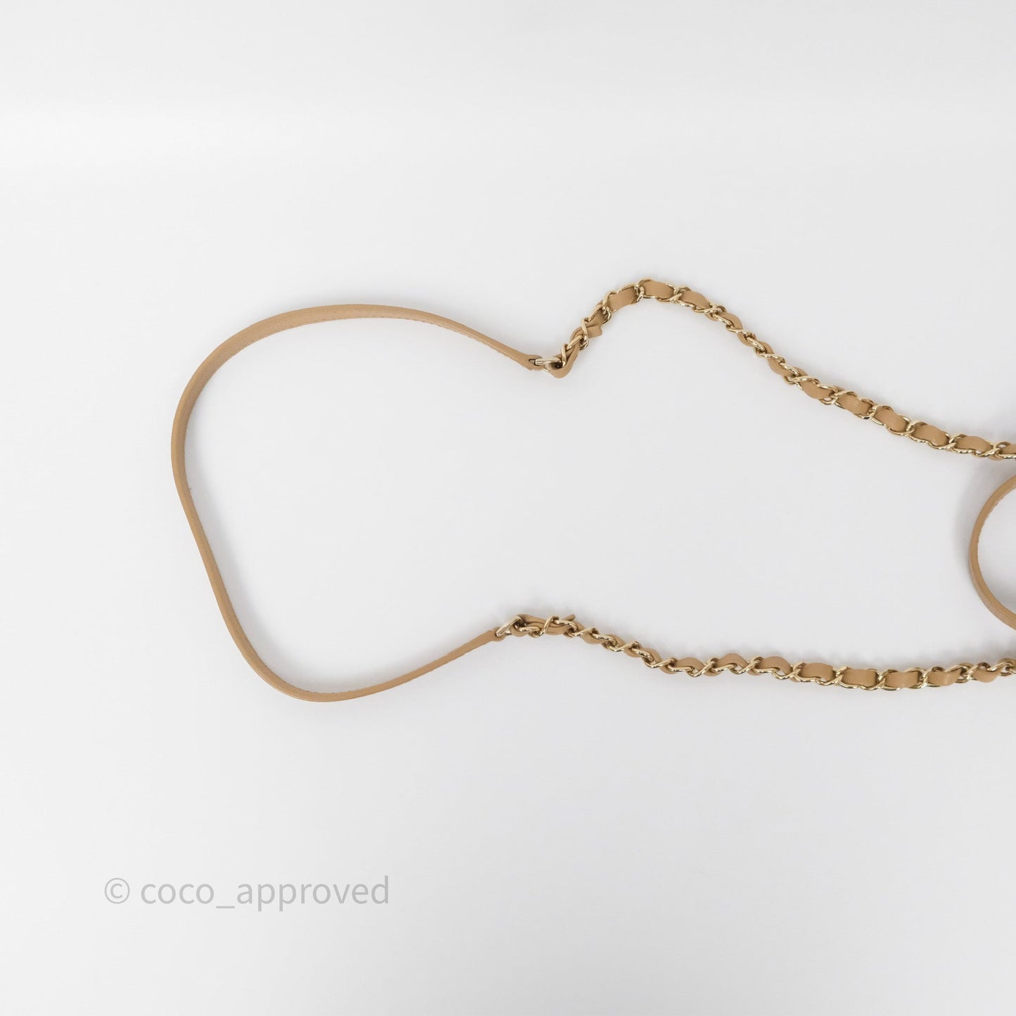 Chanel Rolled Up Bucket Drawstring Bag Beige Caviar Gold Hardware