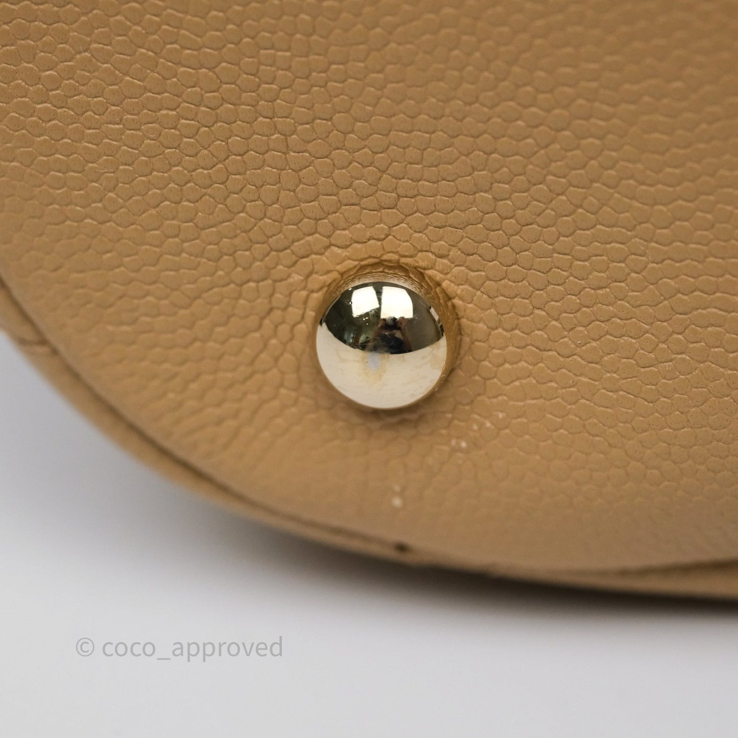 Chanel Rolled Up Bucket Drawstring Bag Beige Caviar Gold Hardware