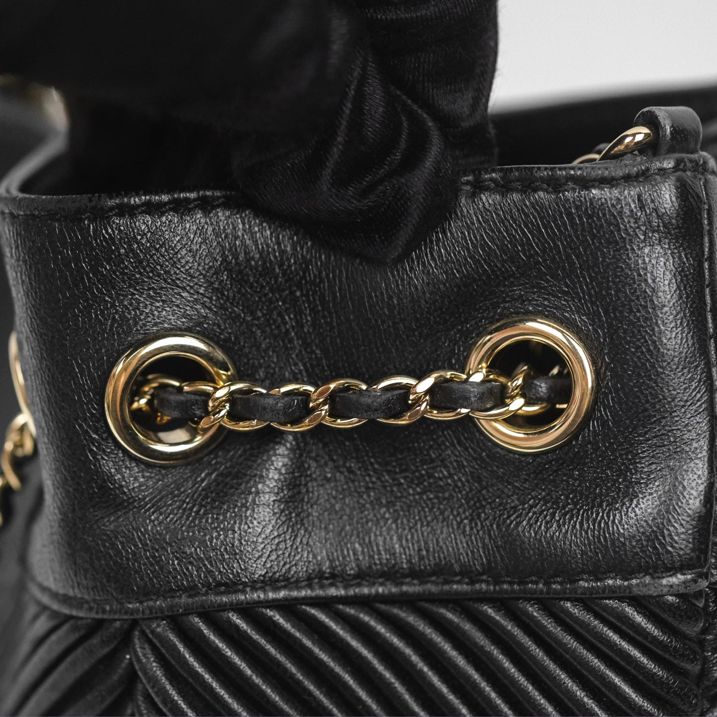 Chanel CC Chain Drawstring Bucket Bag Chevron Black Lambskin Gold Hardware
