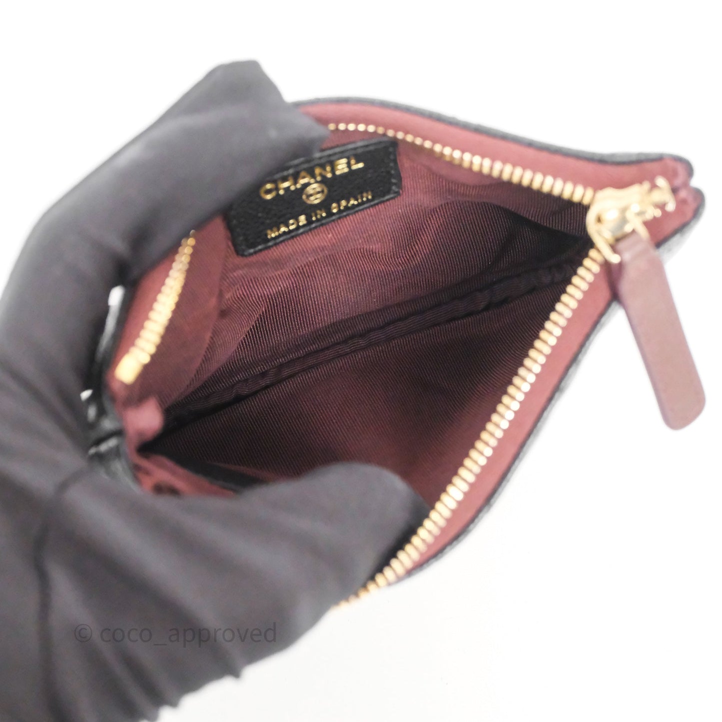 Chanel Quilted Mini O case Black Caviar Gold Hardware