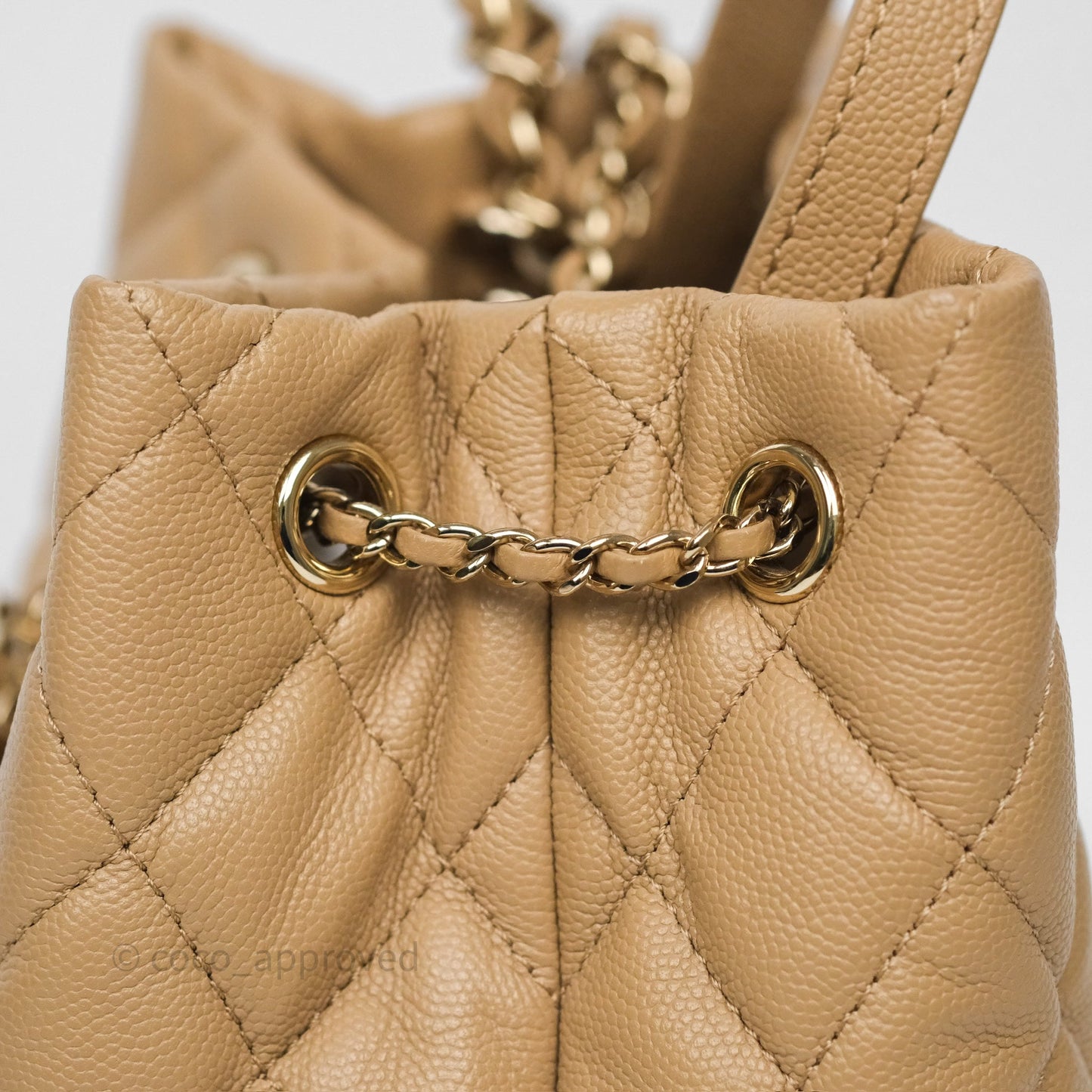 Chanel Rolled Up Bucket Drawstring Bag Beige Caviar Gold Hardware