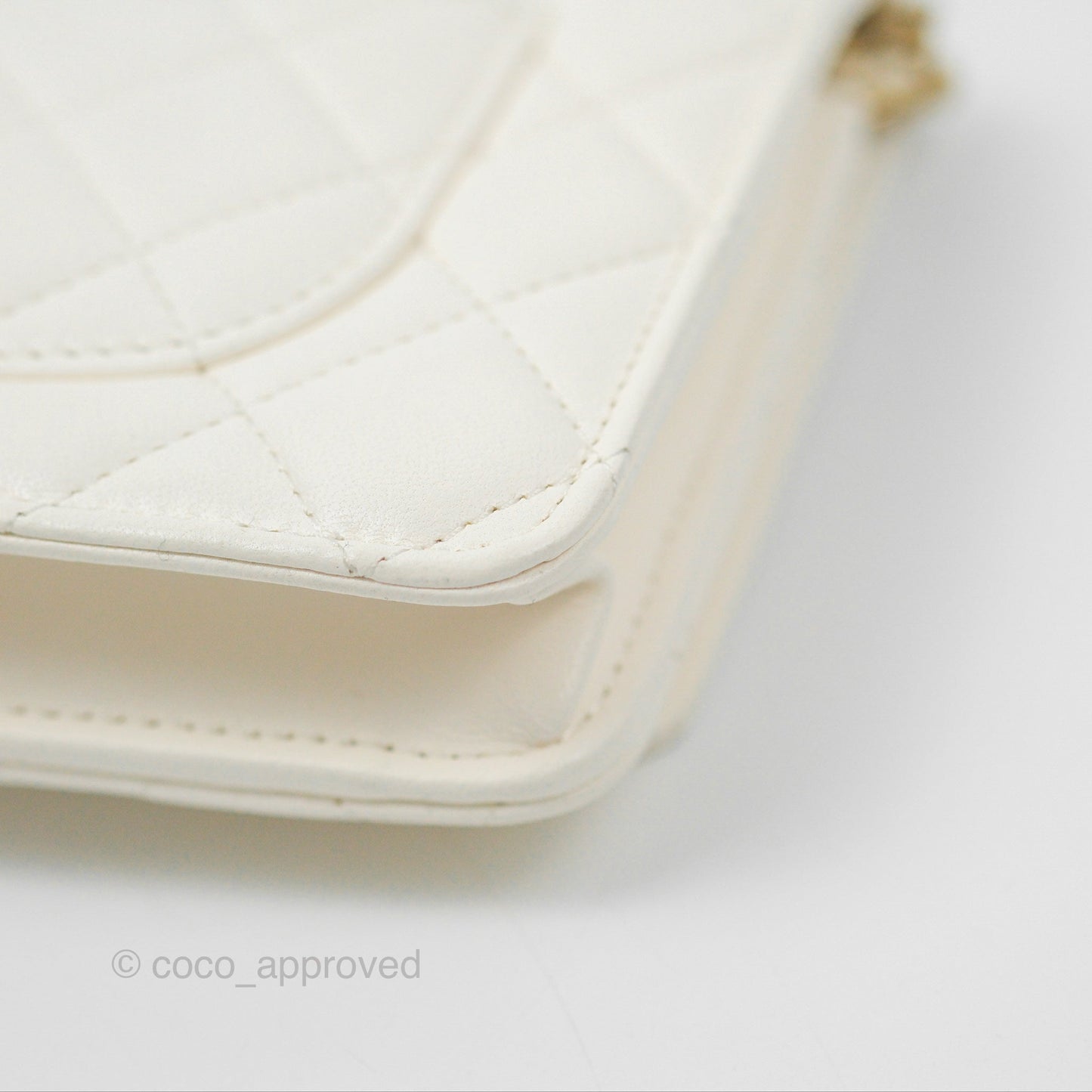 Chanel Quilted WOC White Lambskin Gold Hardware With Charms