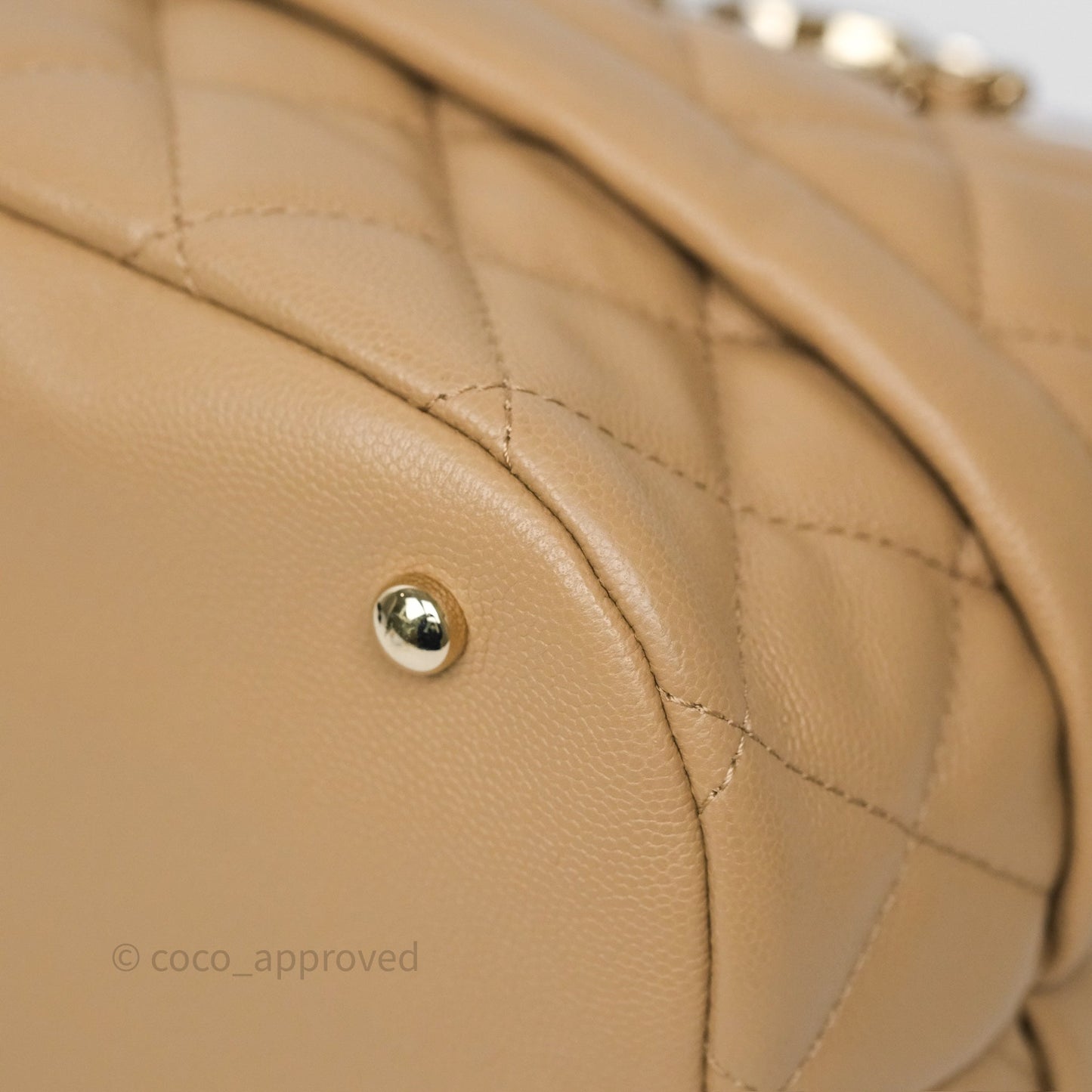 Chanel Rolled Up Bucket Drawstring Bag Beige Caviar Gold Hardware
