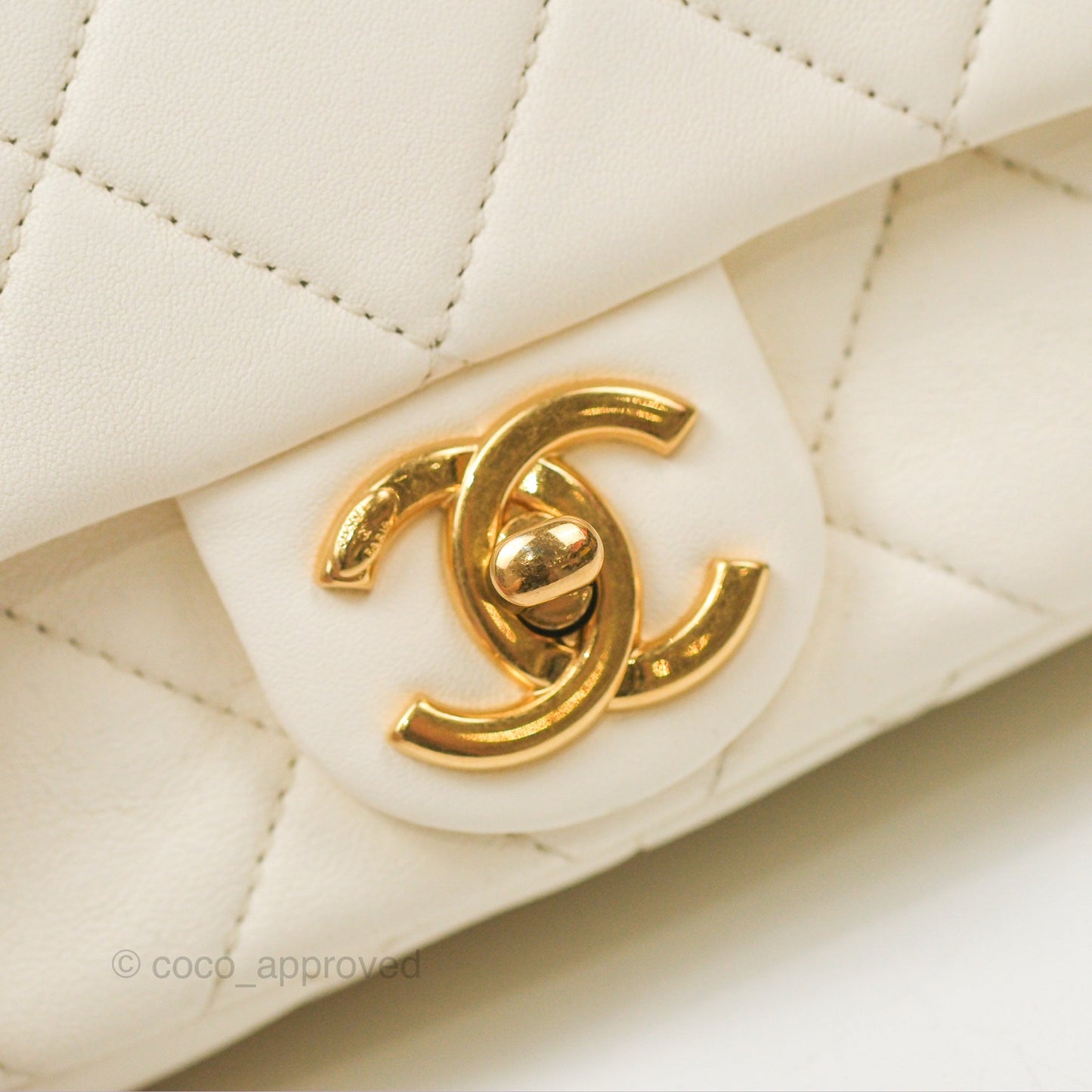 Chanel Quilted Flap Bag With Chanel Logo Top Handle White Calfskin Gold Hardware
