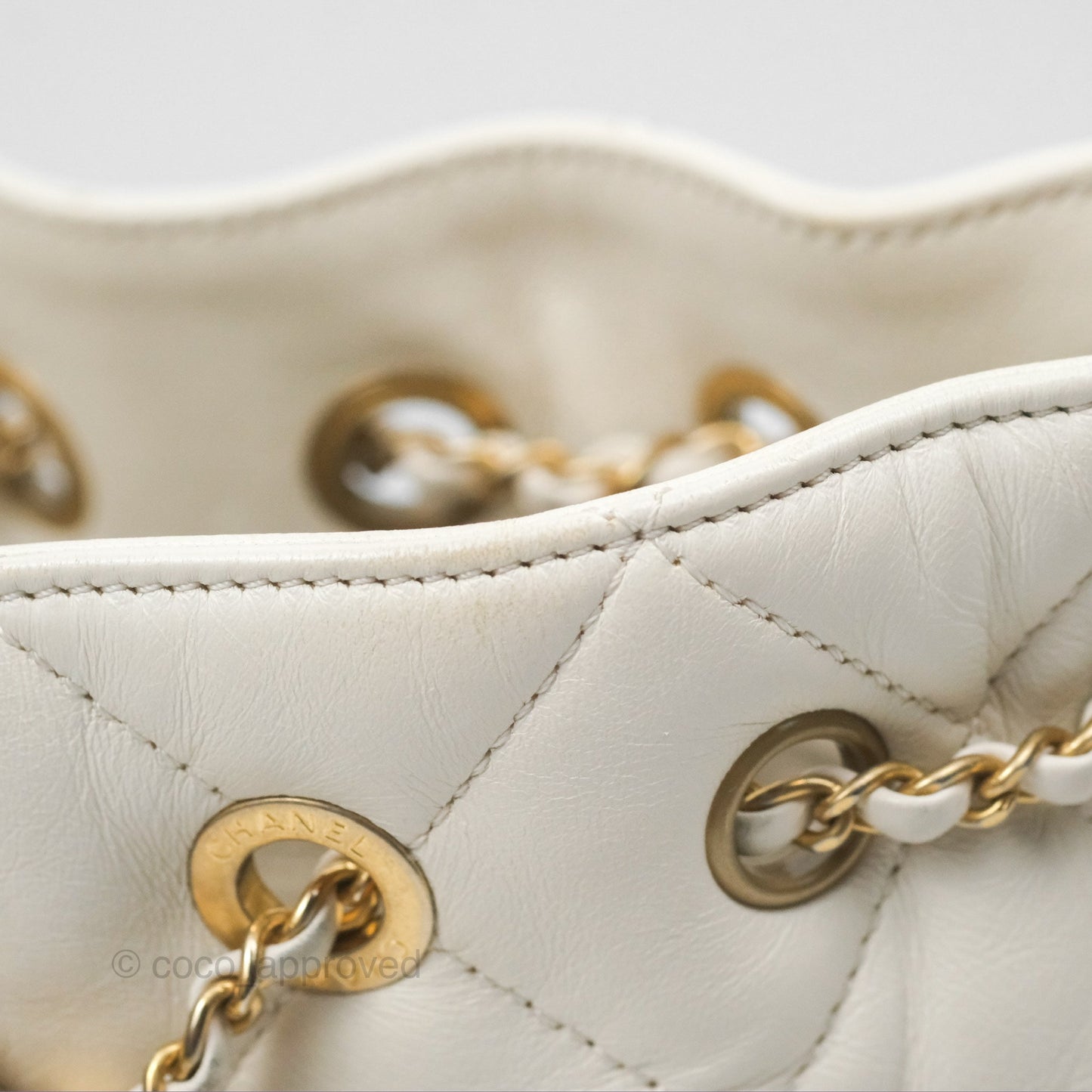 Chanel Quilted Drawstring Bucket Bag Ivory Lambskin Aged Gold Hardware