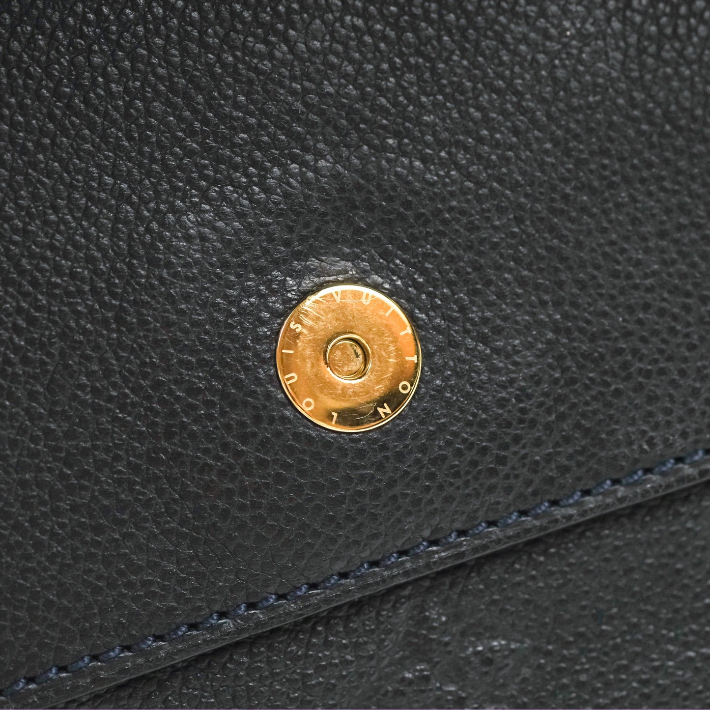Louis Vuitton Petillante Clutch Empreinte Infini Navy