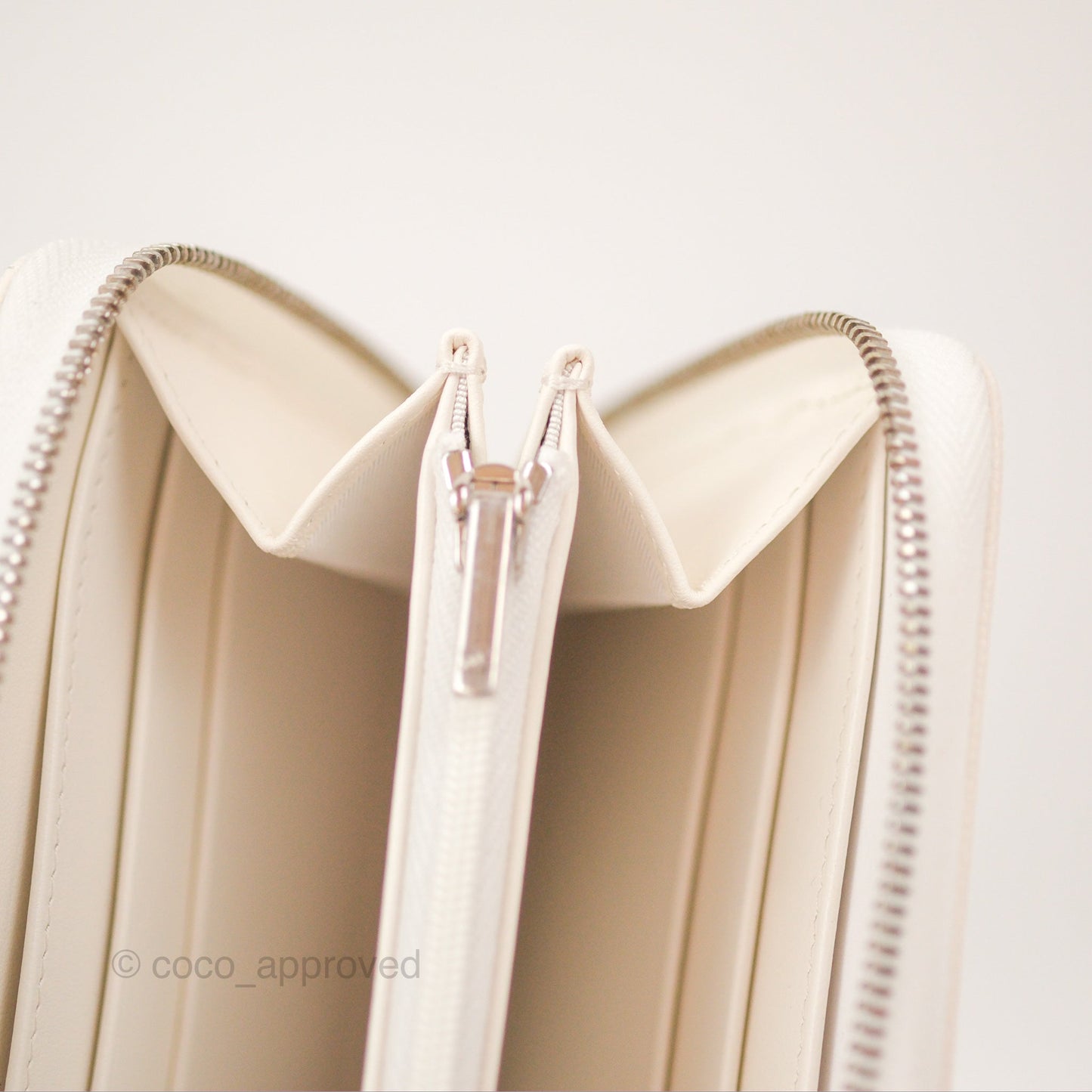 Chanel Quilted Zip Long Wallet White Caviar Silver Hardware