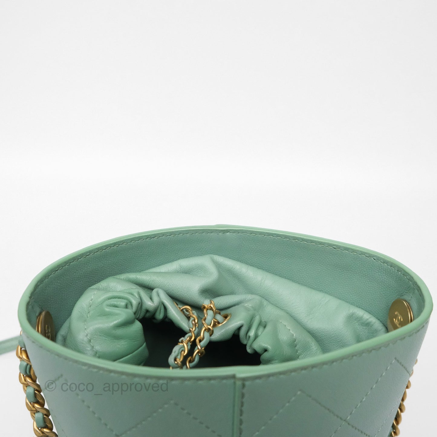 Chanel Drawstring Bucket Bag Quilted Green Caviar Aged Gold Hardware