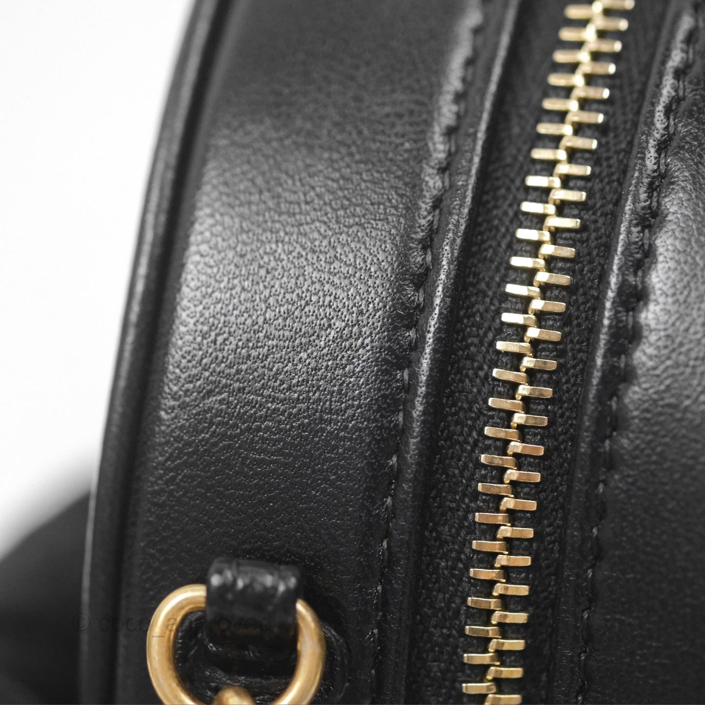 Chanel Studded CC Round Clutch With Chain Black Lambskin Gold Hardware