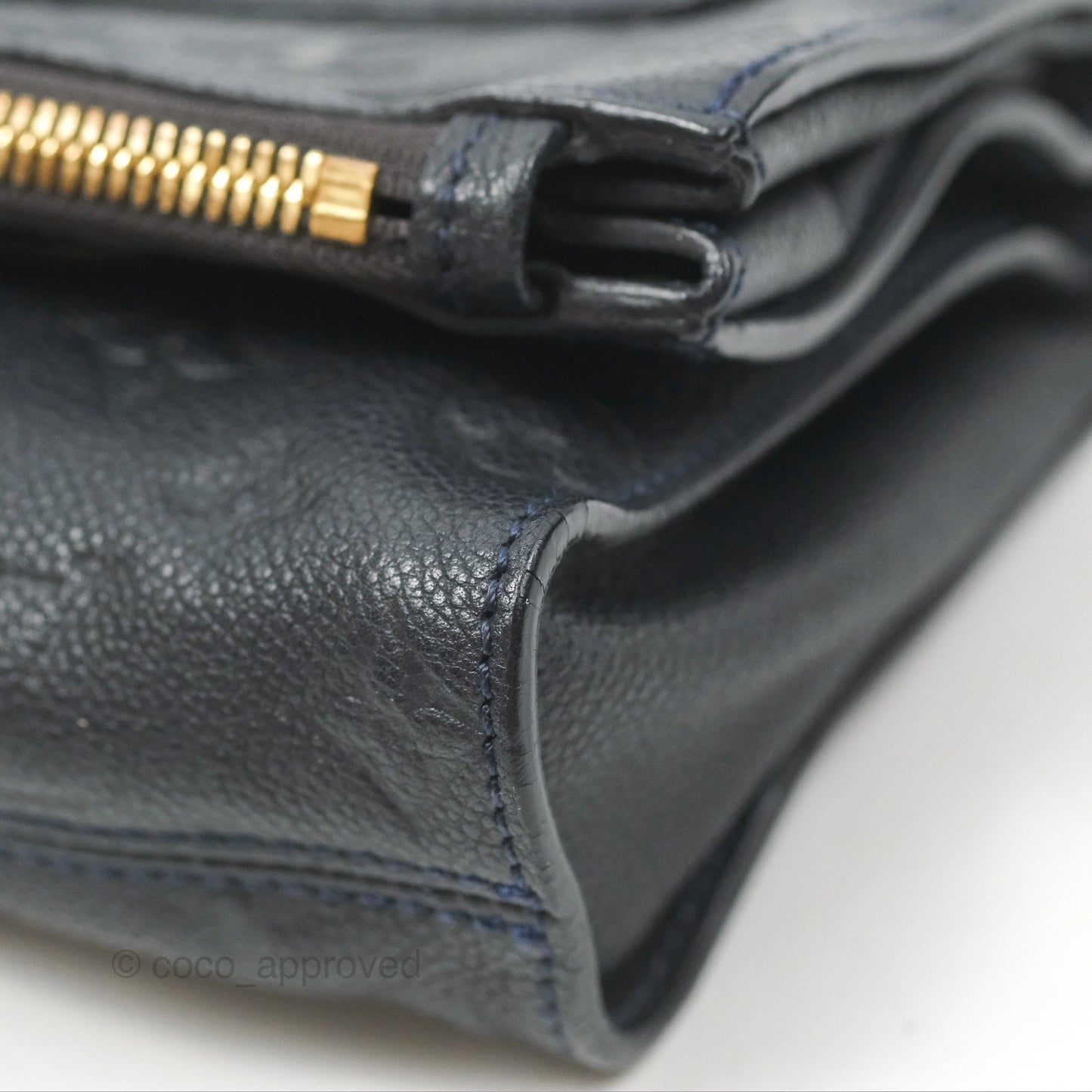 Louis Vuitton Petillante Clutch Empreinte Infini Navy