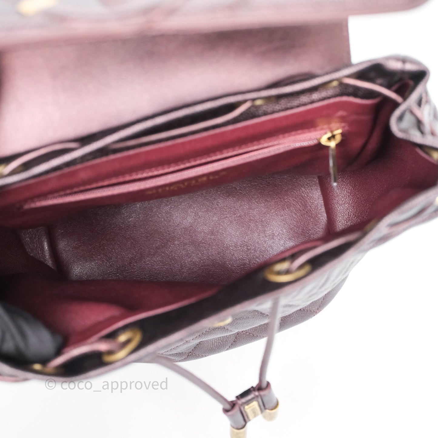 Chanel Quilted Filigree Backpack Iridescent Burgundy Caviar Aged Gold Hardware