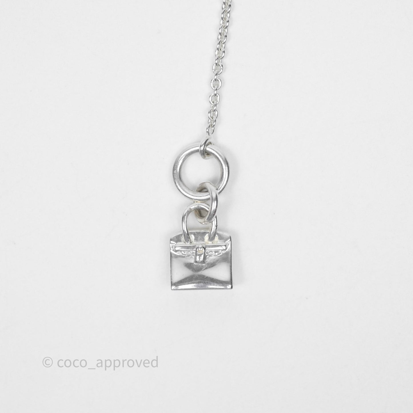 Hermès Amulettes Kelly Pendant in Sterling Silver