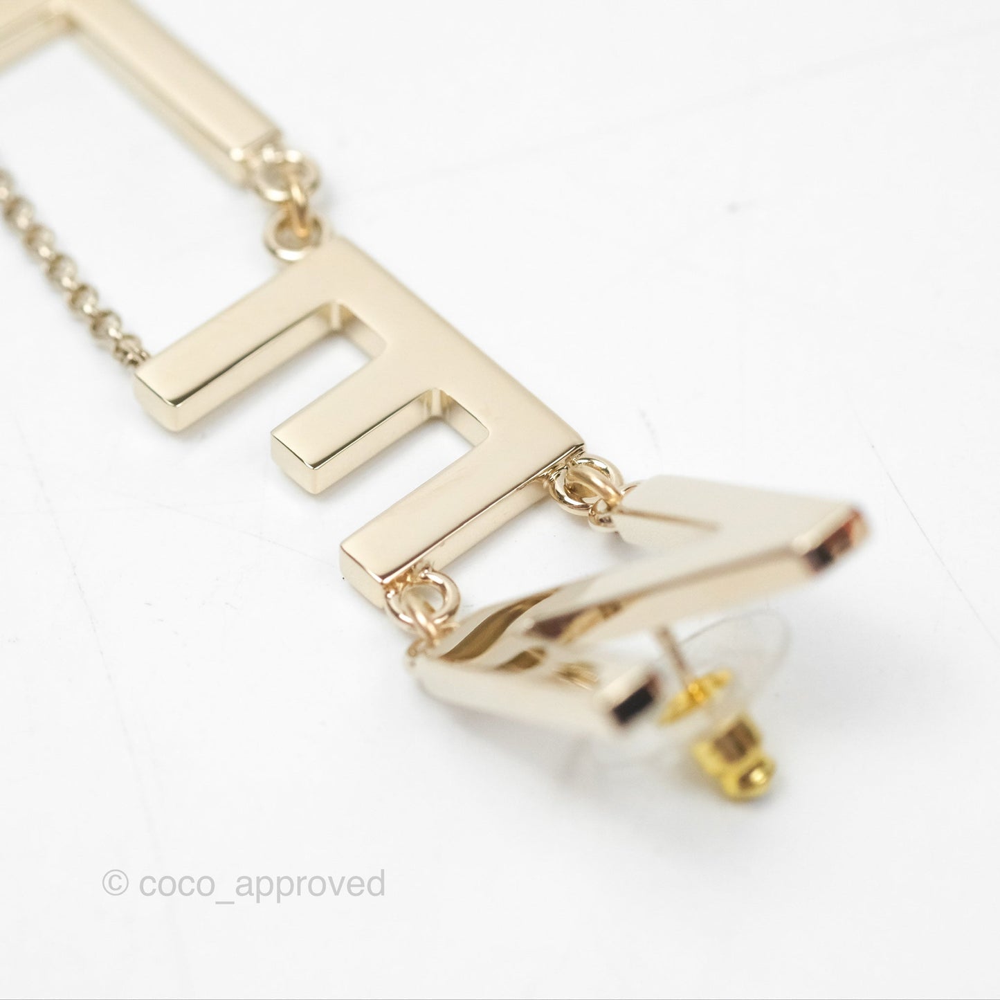 Chanel Letter Cha-Nel Logo Drop Earrings Gold Tone 21V