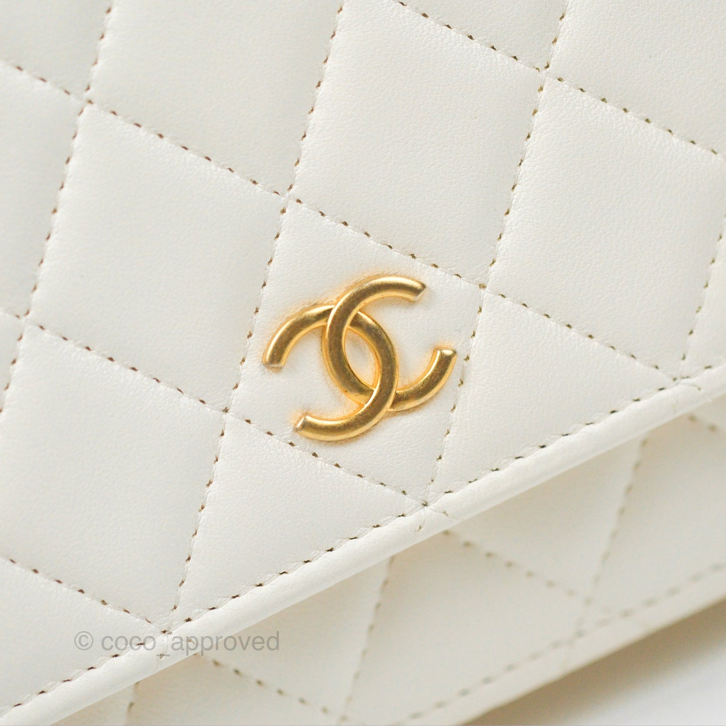 Chanel Quilted WOC White Lambskin Gold Hardware With Charms
