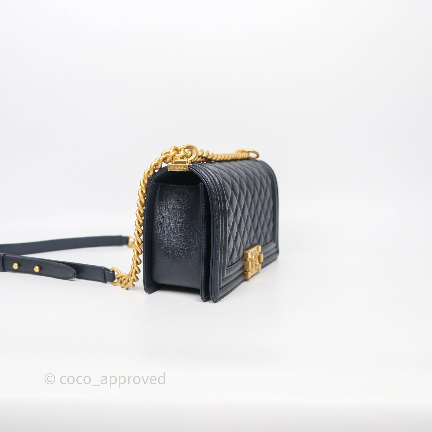 Chanel Quilted Medium Boy Dark Navy Caviar Aged Gold Hardware