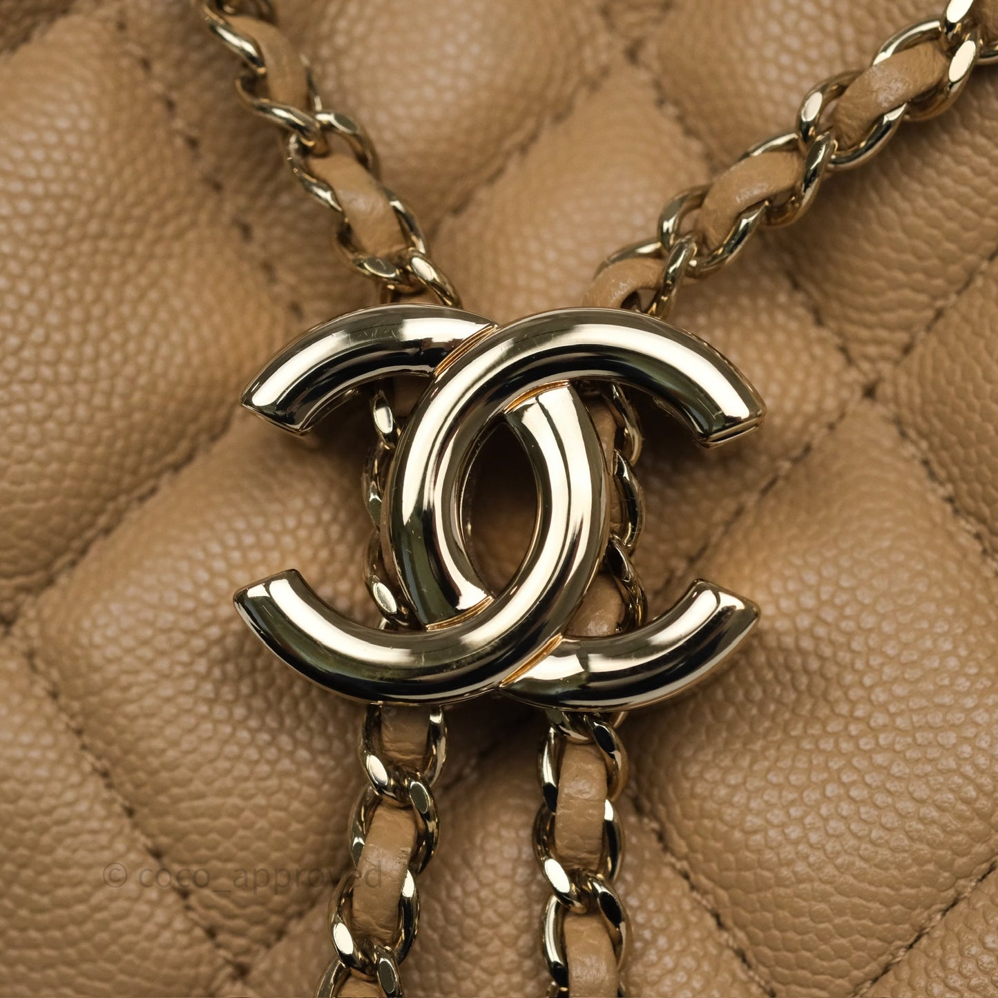Chanel Rolled Up Bucket Drawstring Bag Beige Caviar Gold Hardware