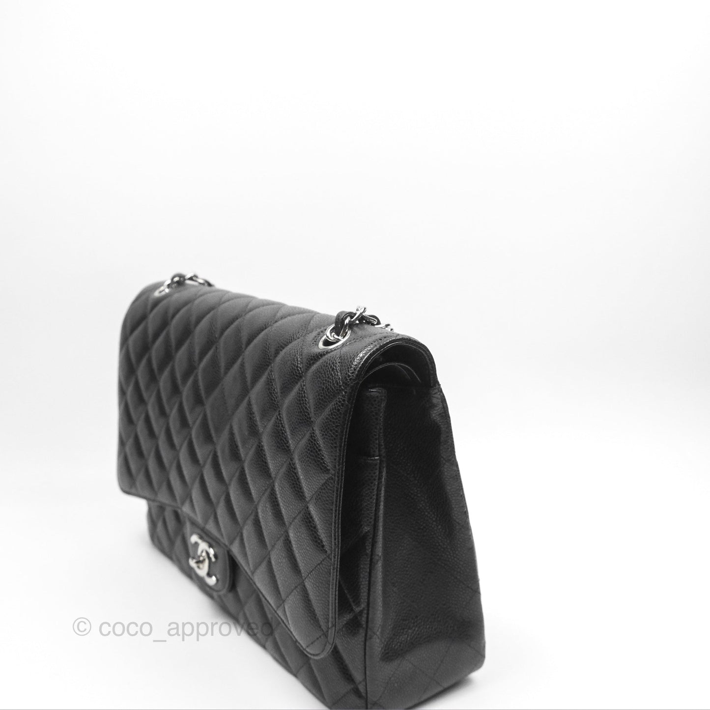 Chanel Quilted Maxi Double Flap Black Caviar Silver Hardware