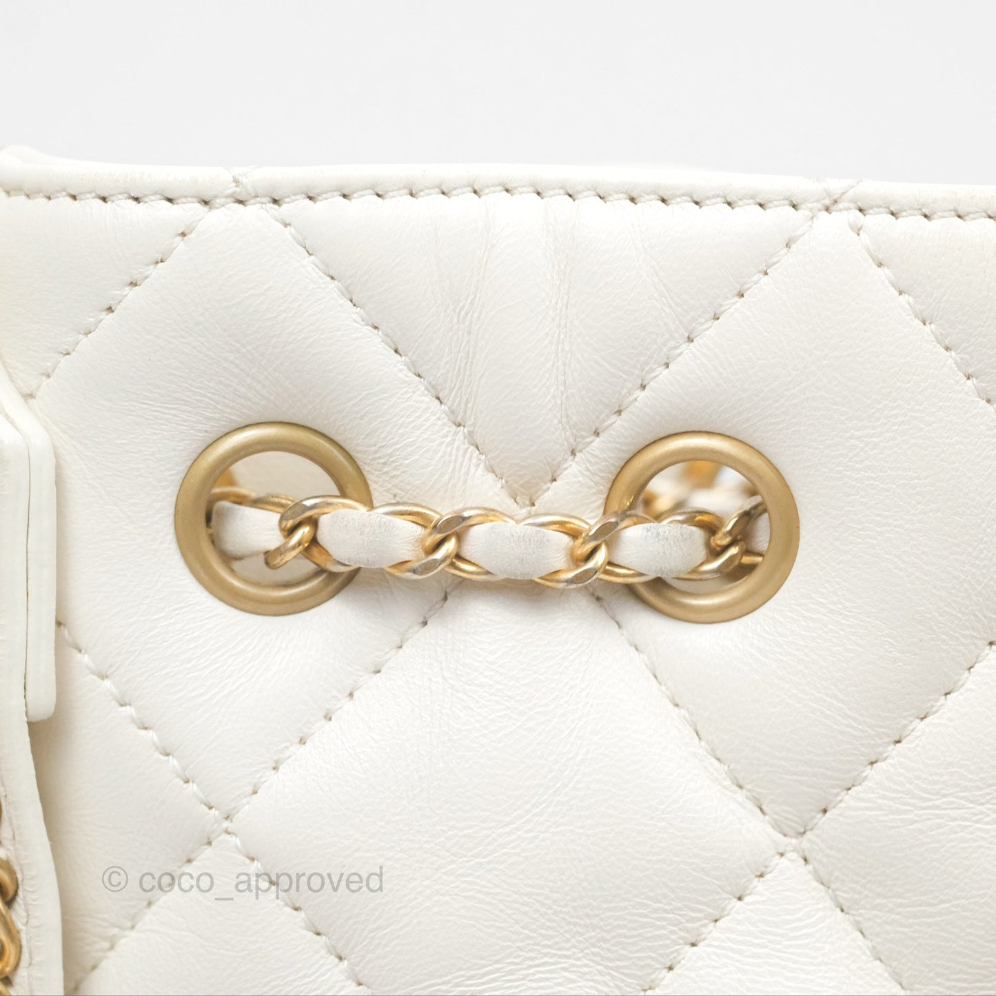 Chanel Quilted Drawstring Bucket Bag Ivory Lambskin Aged Gold Hardware