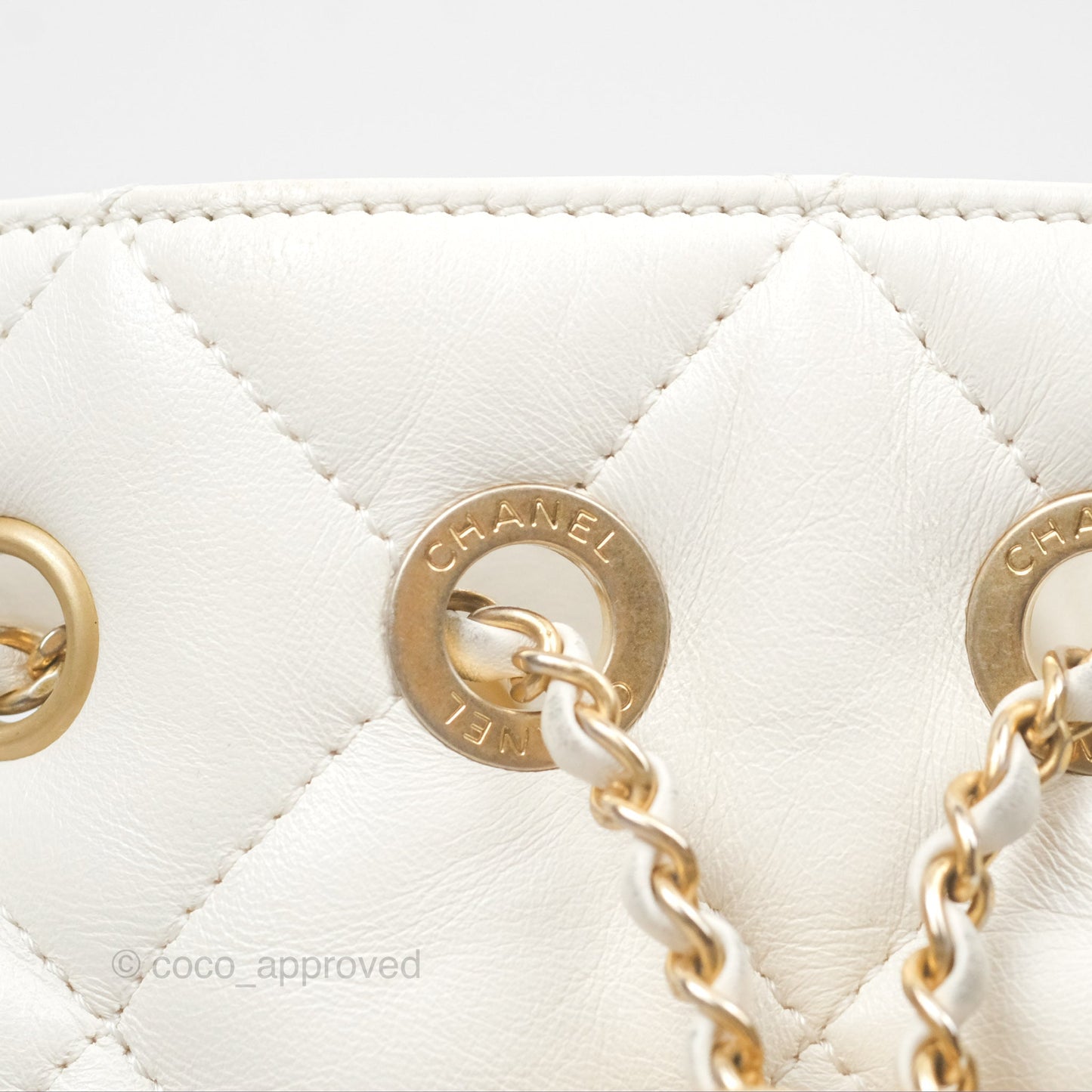 Chanel Quilted Drawstring Bucket Bag Ivory Lambskin Aged Gold Hardware
