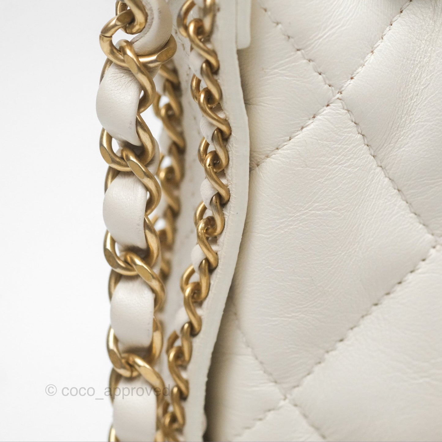 Chanel Quilted Drawstring Bucket Bag Ivory Lambskin Aged Gold Hardware