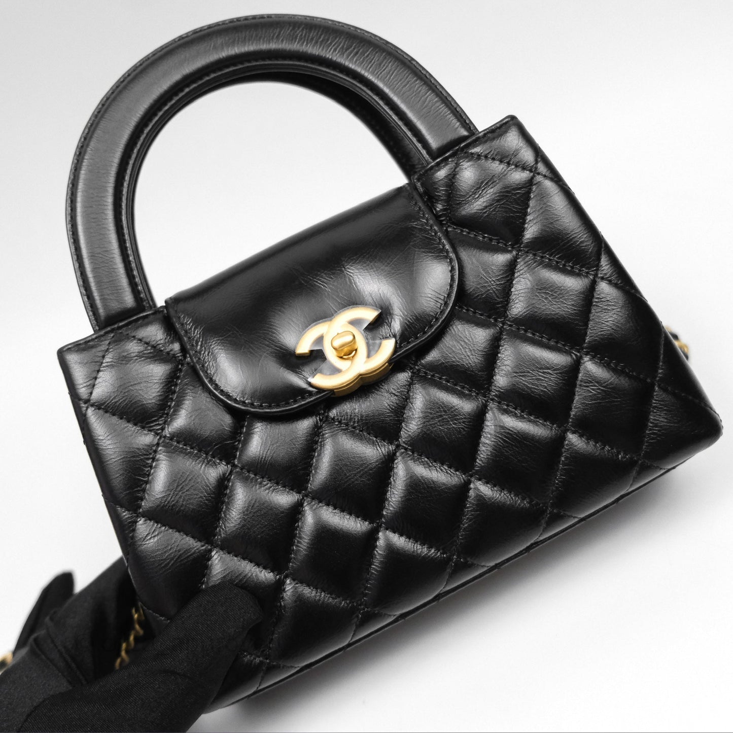 Chanel Kelly Bag Quilted Black Shiny Crumpled Calfskin Aged Gold Hardware