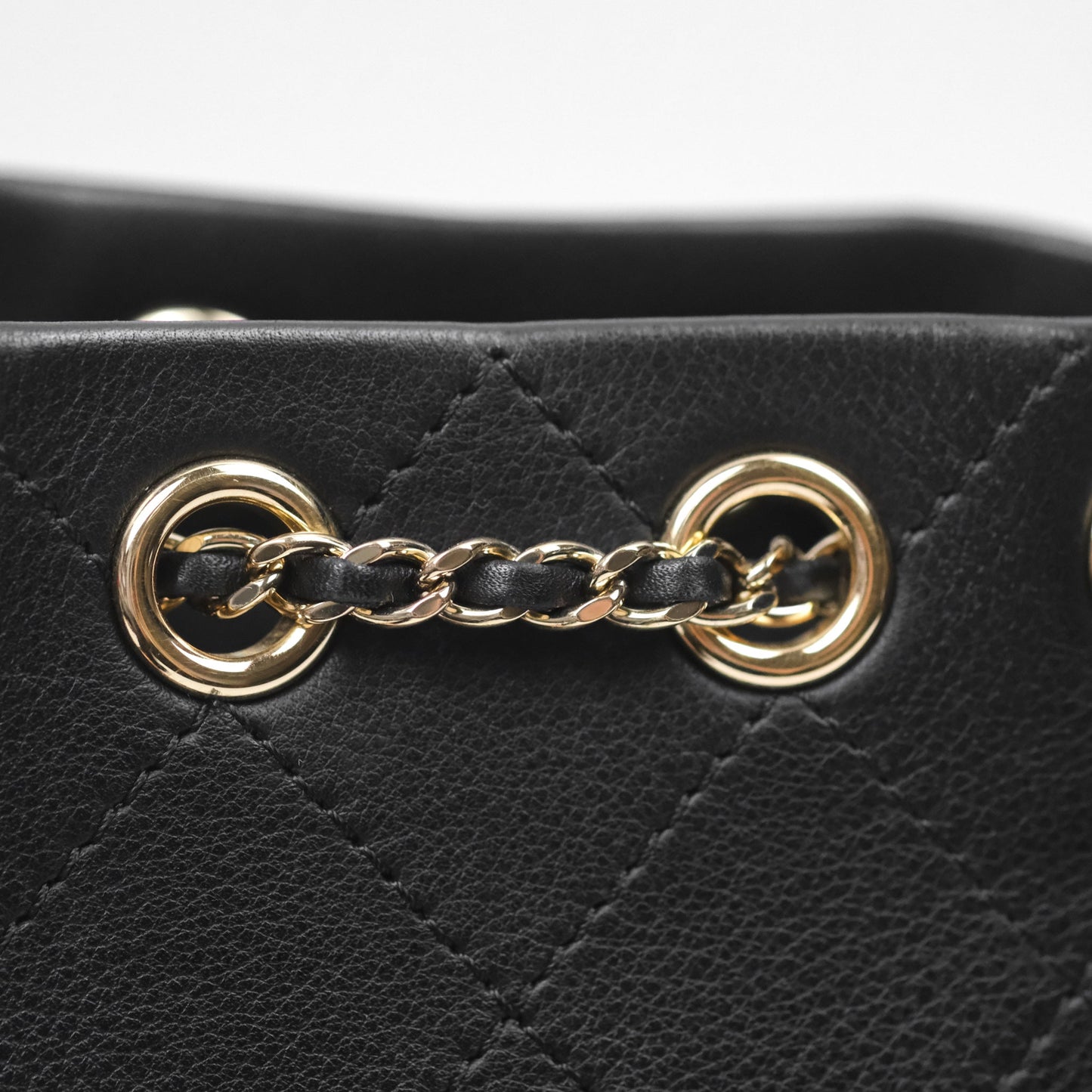 Chanel Quilted Drawstring Bucket Bag Black Calfskin Gold Hardware