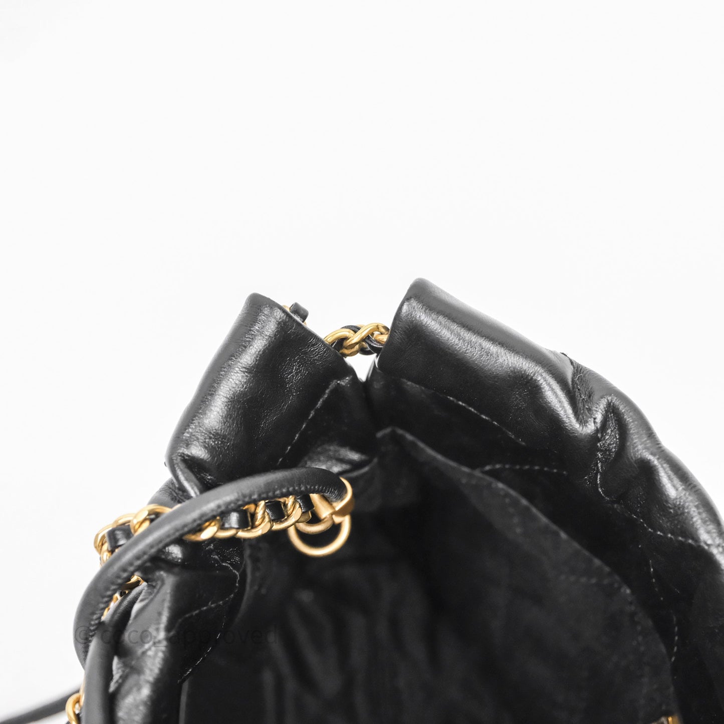 Chanel 22 Mini Bag Black Crumpled Calfskin White Lacquered Metal Logo
