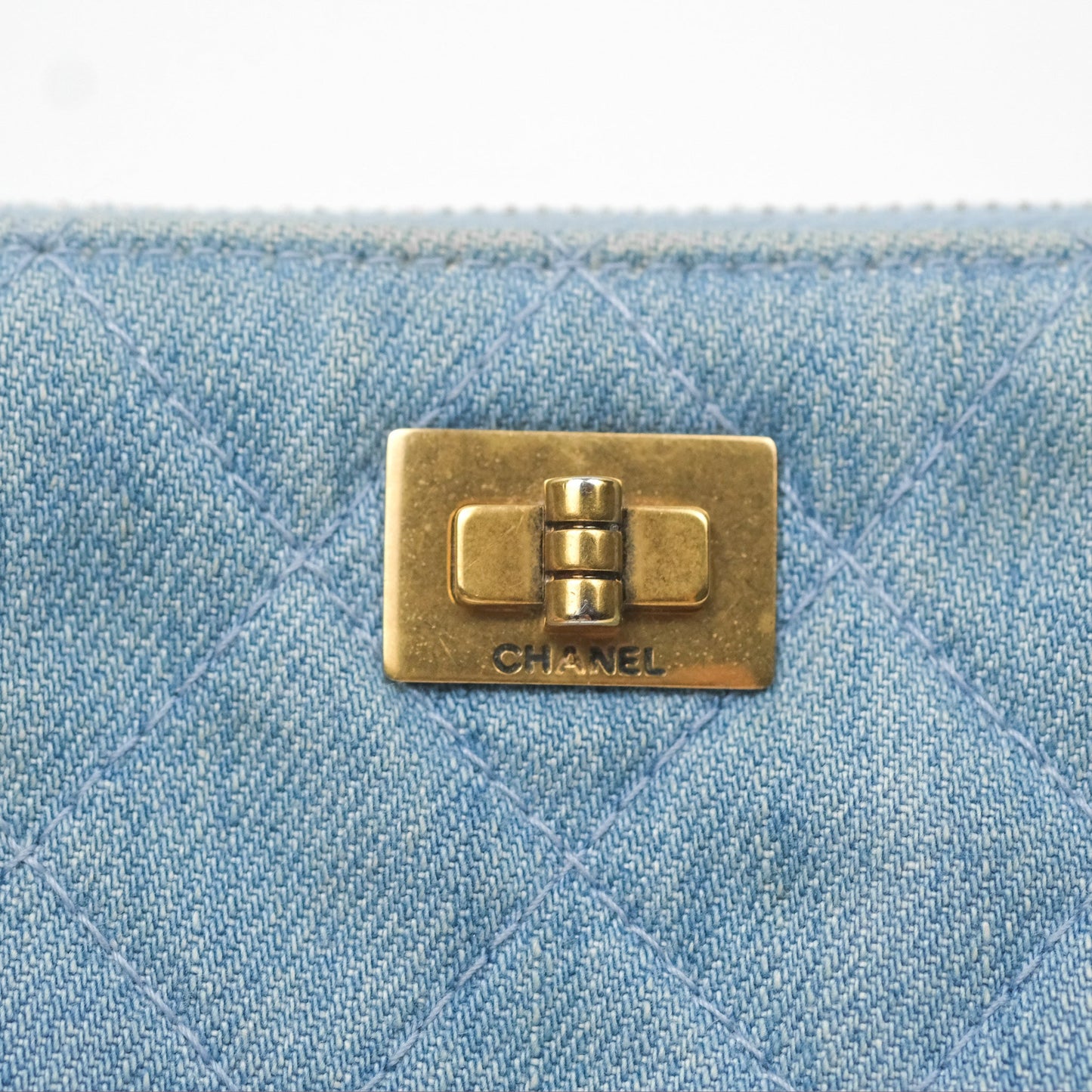 Chanel Mini Reissue O Case Quilted Light Blue Denim Aged Gold Hardware