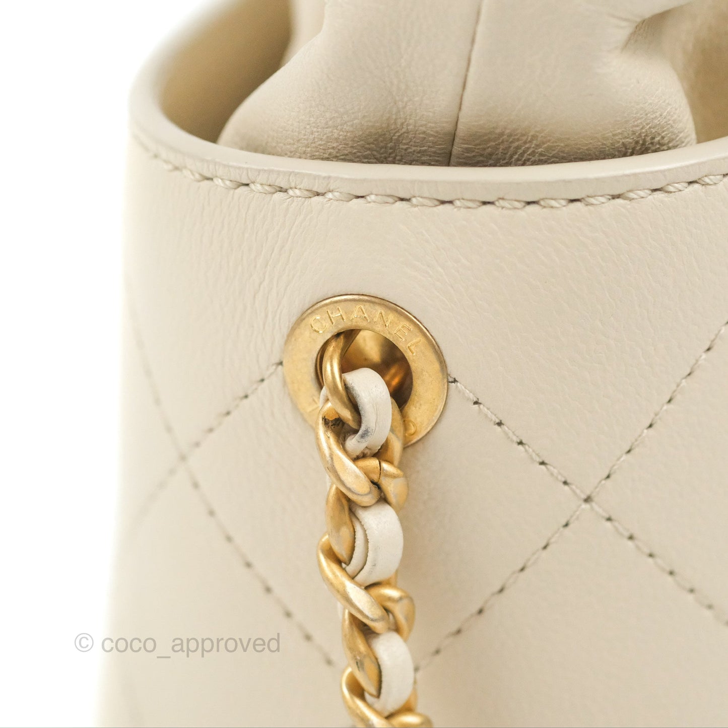 Chanel Quilted Drawstring Bucket Bag Ivory Lambskin Aged Gold Hardware 19C