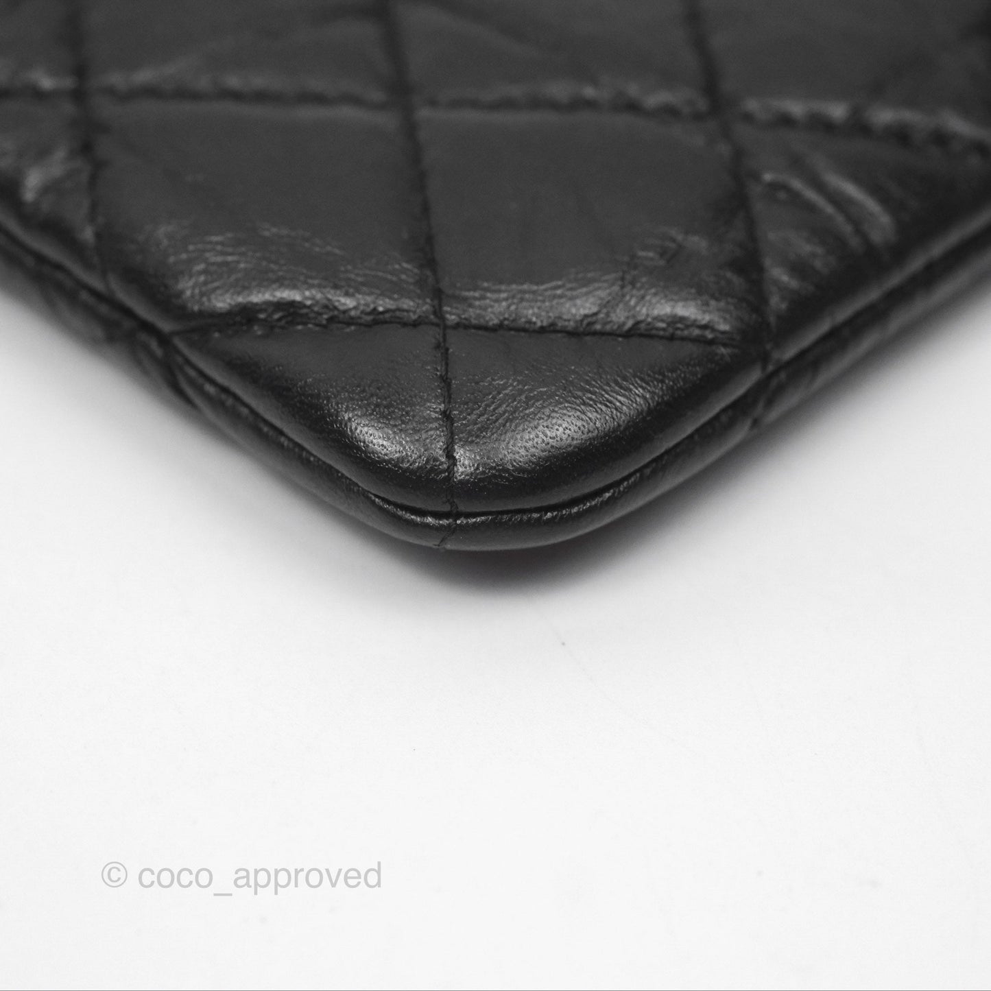 Chanel Quilted Mini Reissue O Case Black Calfskin Aged Gold Hardware