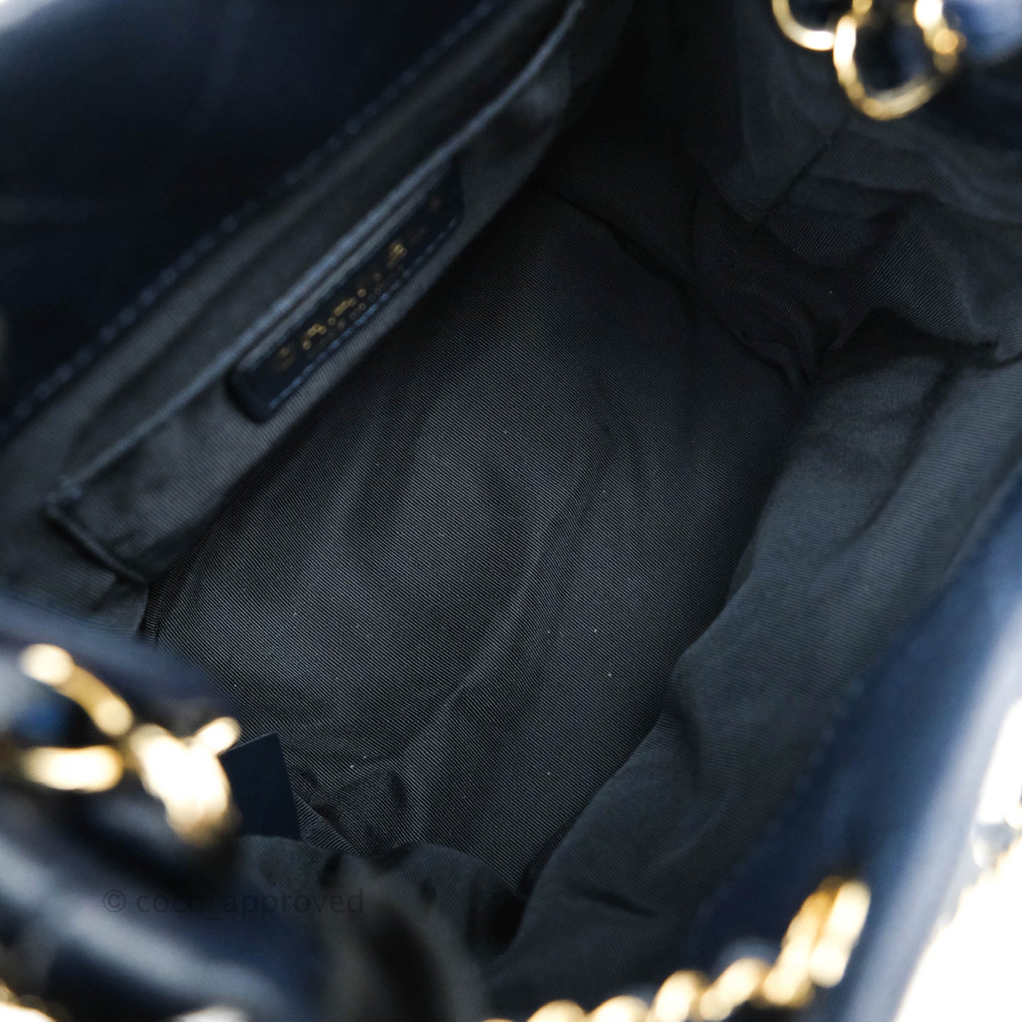 Chanel Quilted Rolled Up Bucket Drawstring Bag Navy Caviar Gold Hardware