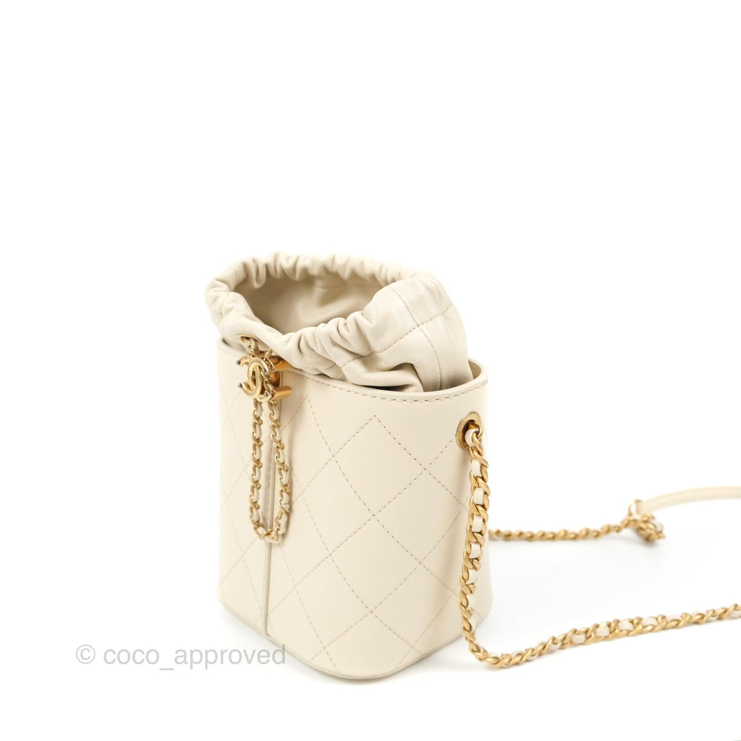 Chanel Quilted Drawstring Bucket Bag Ivory Lambskin Aged Gold Hardware 19C