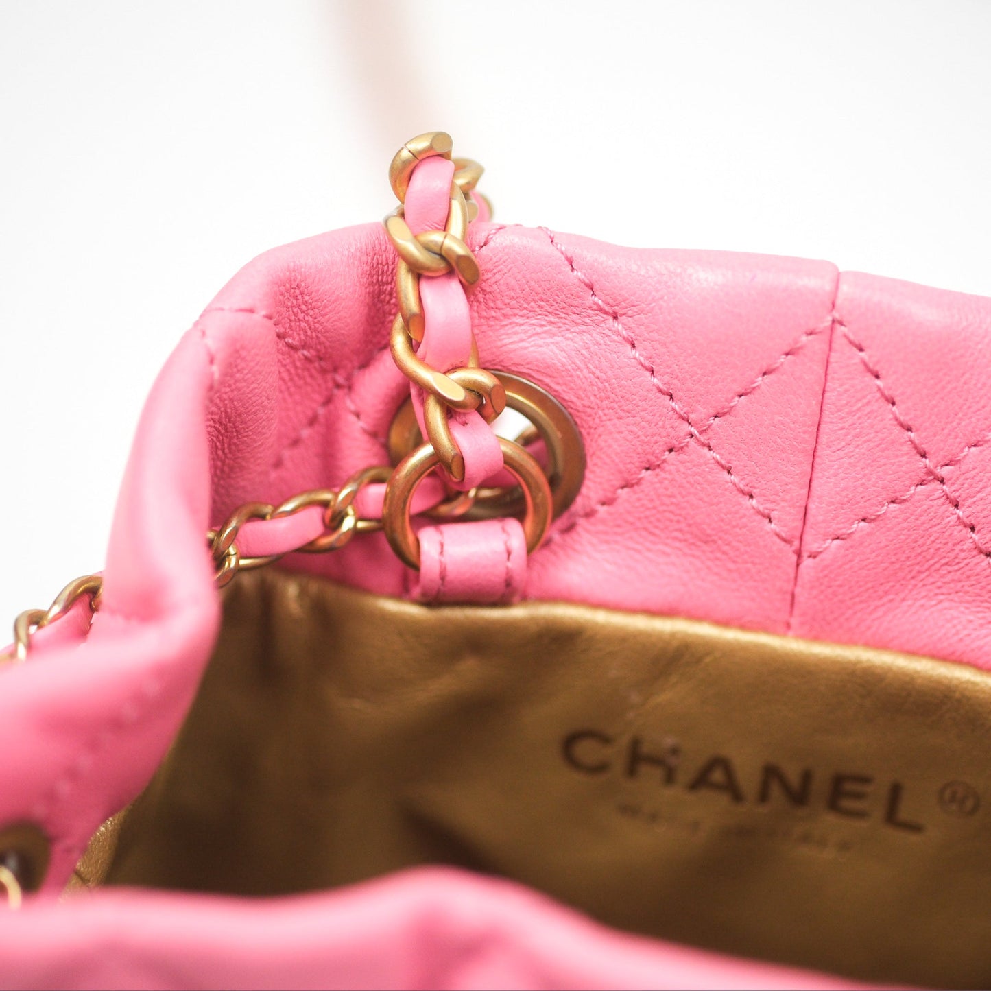 Chanel Pearl Crush Drawstring Bucket Bag Pink Lambskin Aged Gold Hardware
