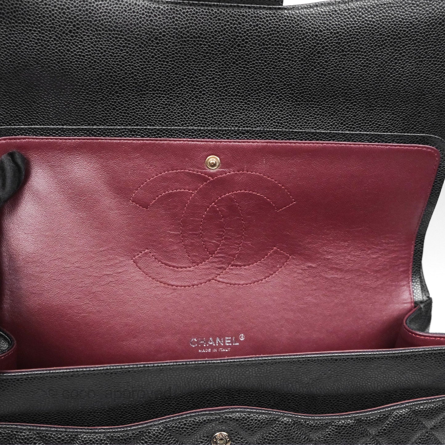 Chanel Quilted Maxi Double Flap Black Caviar Silver Hardware
