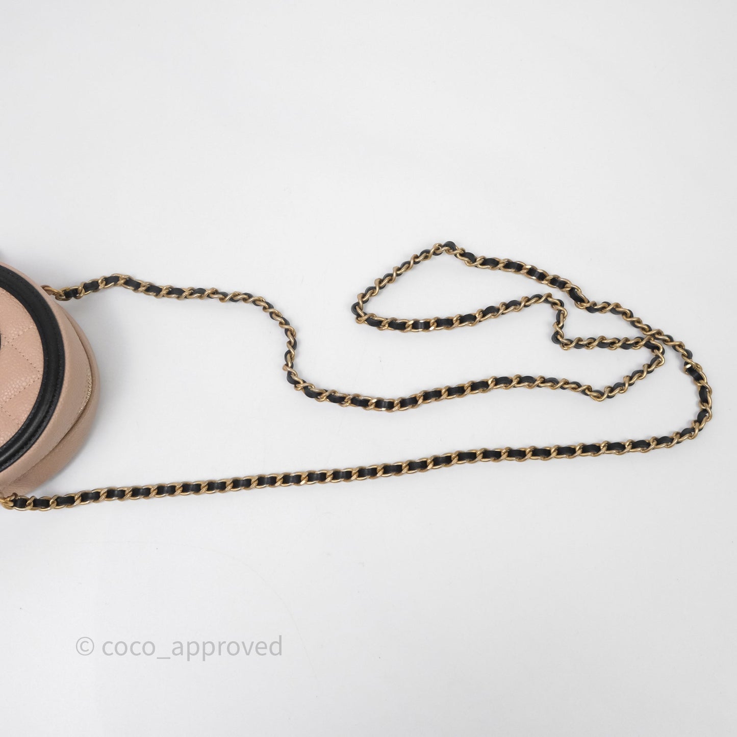 Chanel Quilted Round Filigree Clutch With Chain Beige/ Black Caviar Aged Gold Hardware