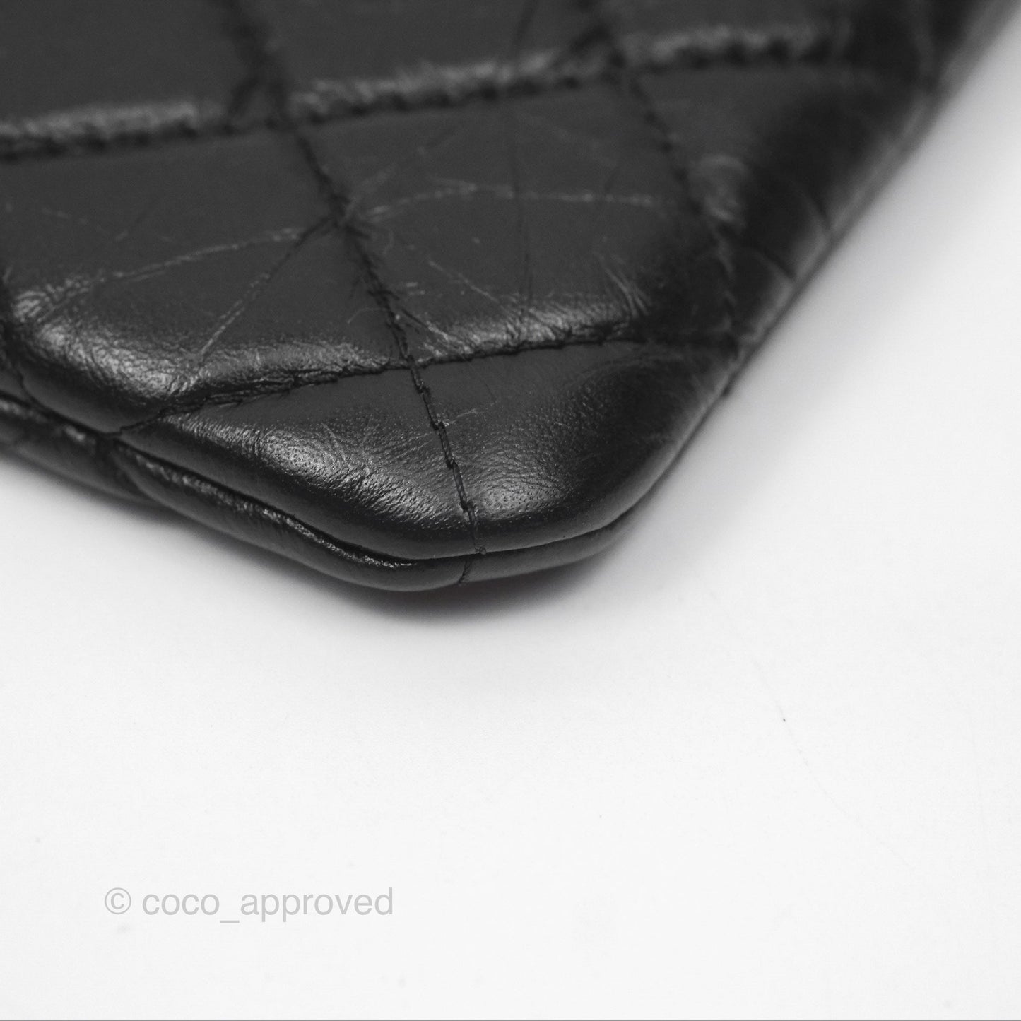 Chanel Quilted Mini Reissue O Case Black Calfskin Aged Gold Hardware