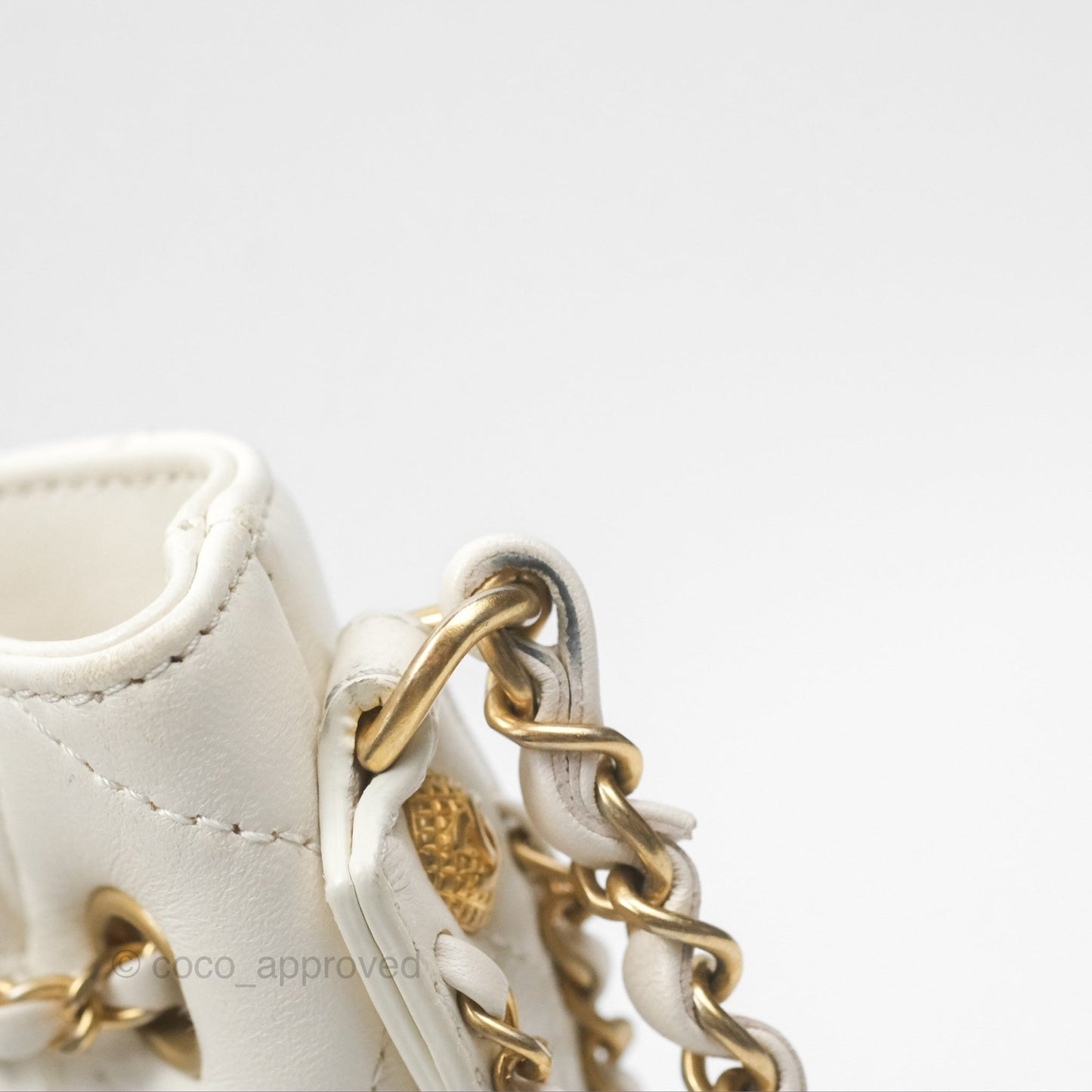 Chanel Quilted Drawstring Bucket Bag Ivory Lambskin Aged Gold Hardware