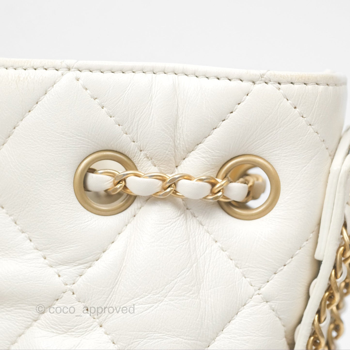 Chanel Quilted Drawstring Bucket Bag Ivory Lambskin Aged Gold Hardware