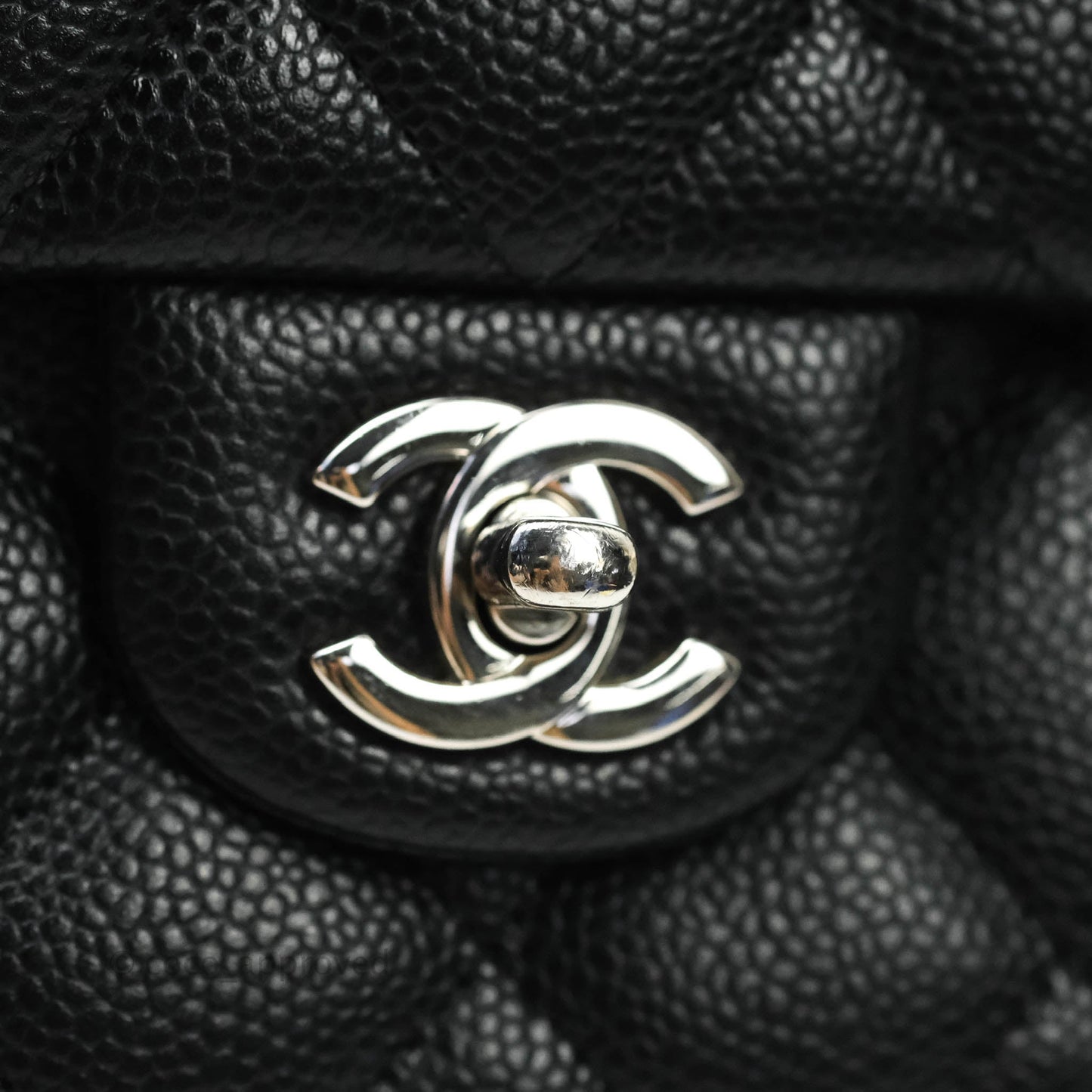Chanel Quilted Clutch with Chain Black Caviar Silver Hardware