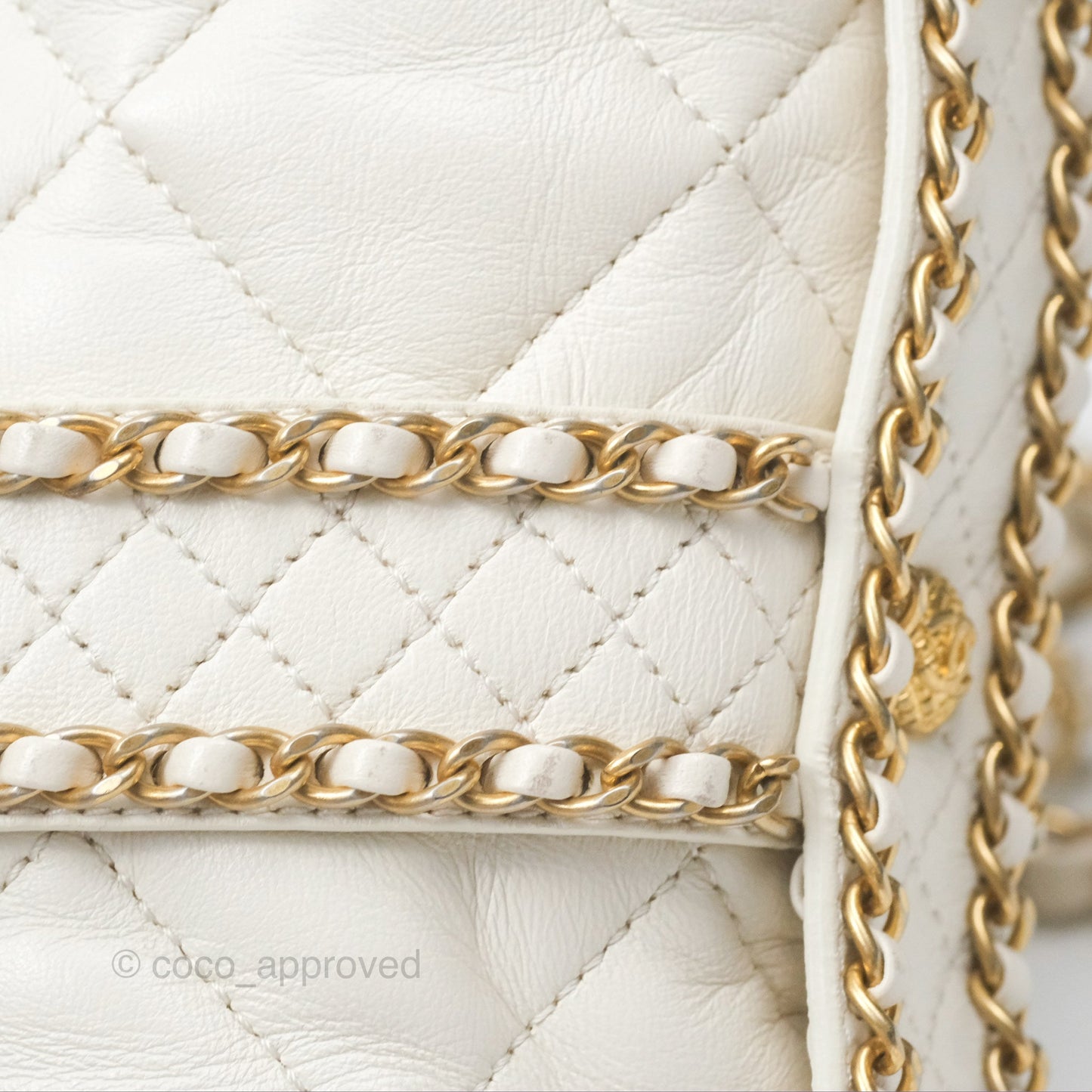 Chanel Quilted Drawstring Bucket Bag Ivory Lambskin Aged Gold Hardware