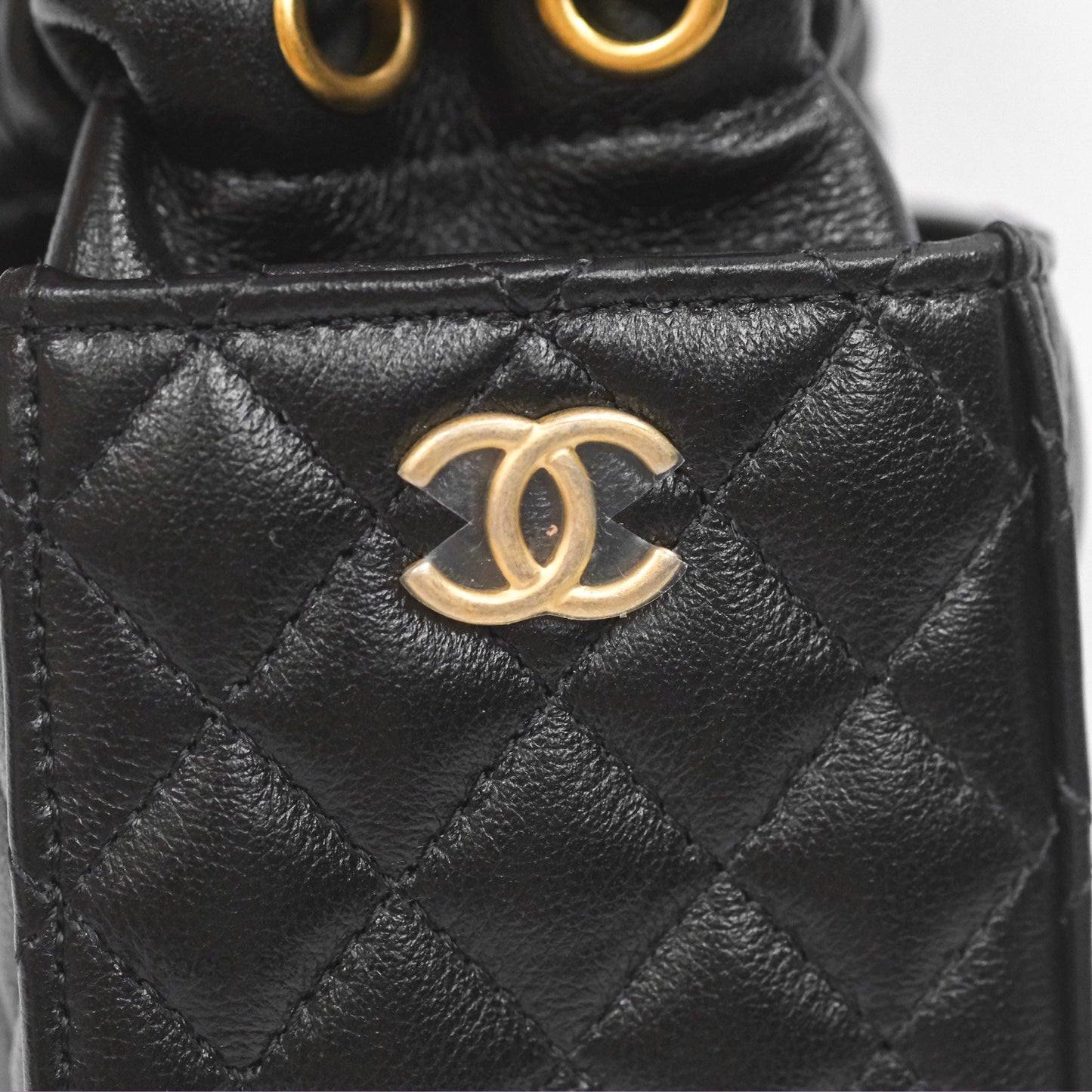 Chanel Mini Drawstring Bucket Bag with Chain Black Calfskin Aged Gold Hardware