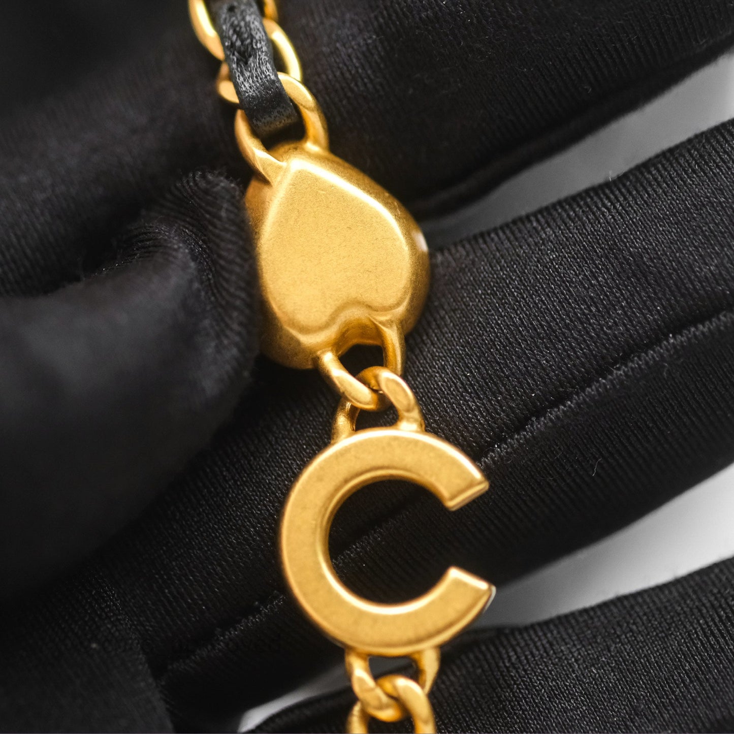 Chanel Vanity with COCO Heart Chain Black Lambskin Aged Gold Hardware