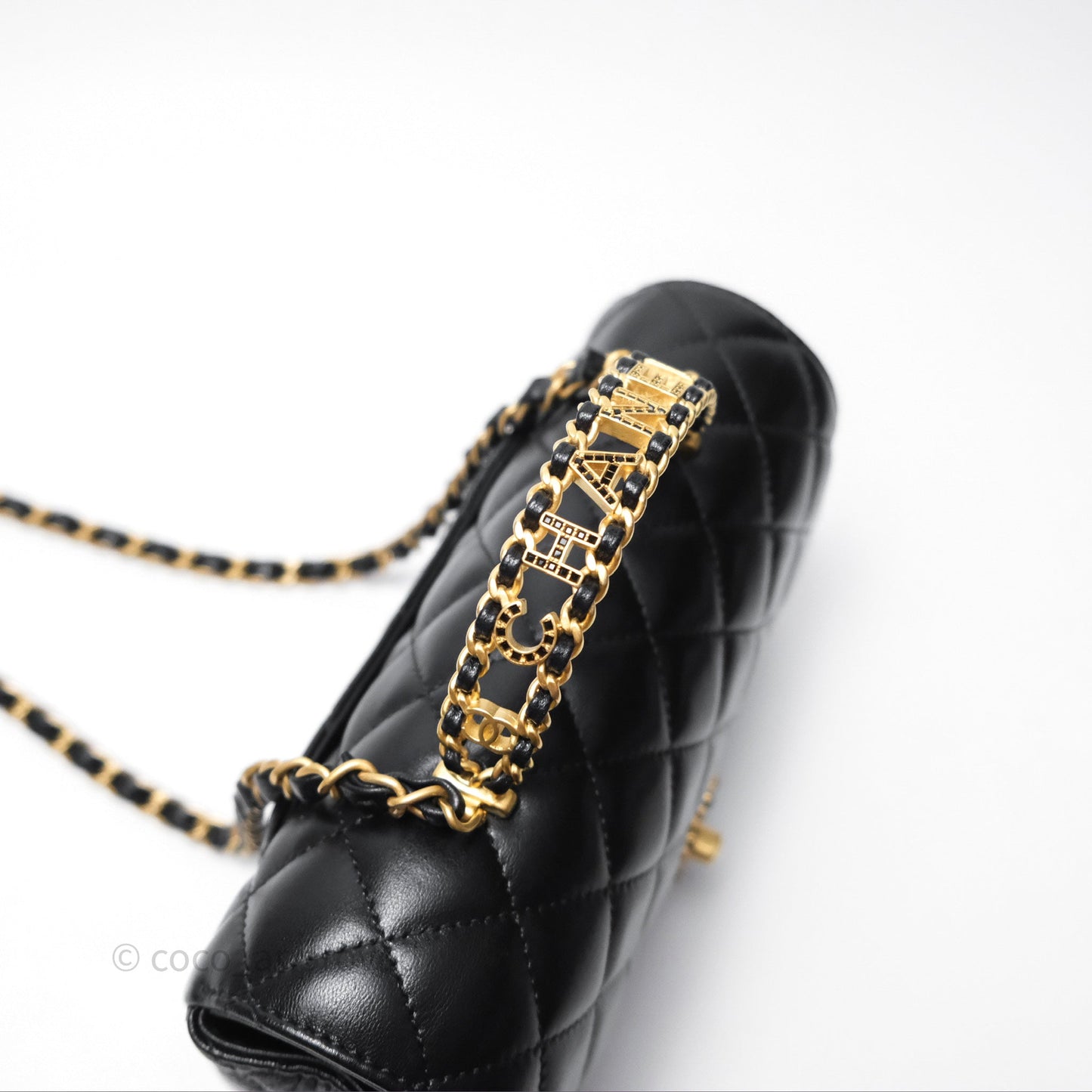 Chanel Flap Bag with Crystal Logo Top Handle Black Lambskin Aged Gold Hardware
