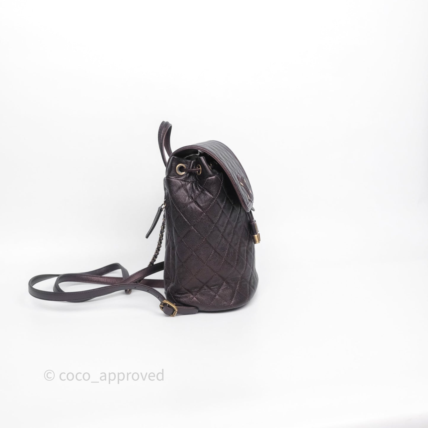 Chanel Quilted Filigree Backpack Iridescent Burgundy Caviar Aged Gold Hardware
