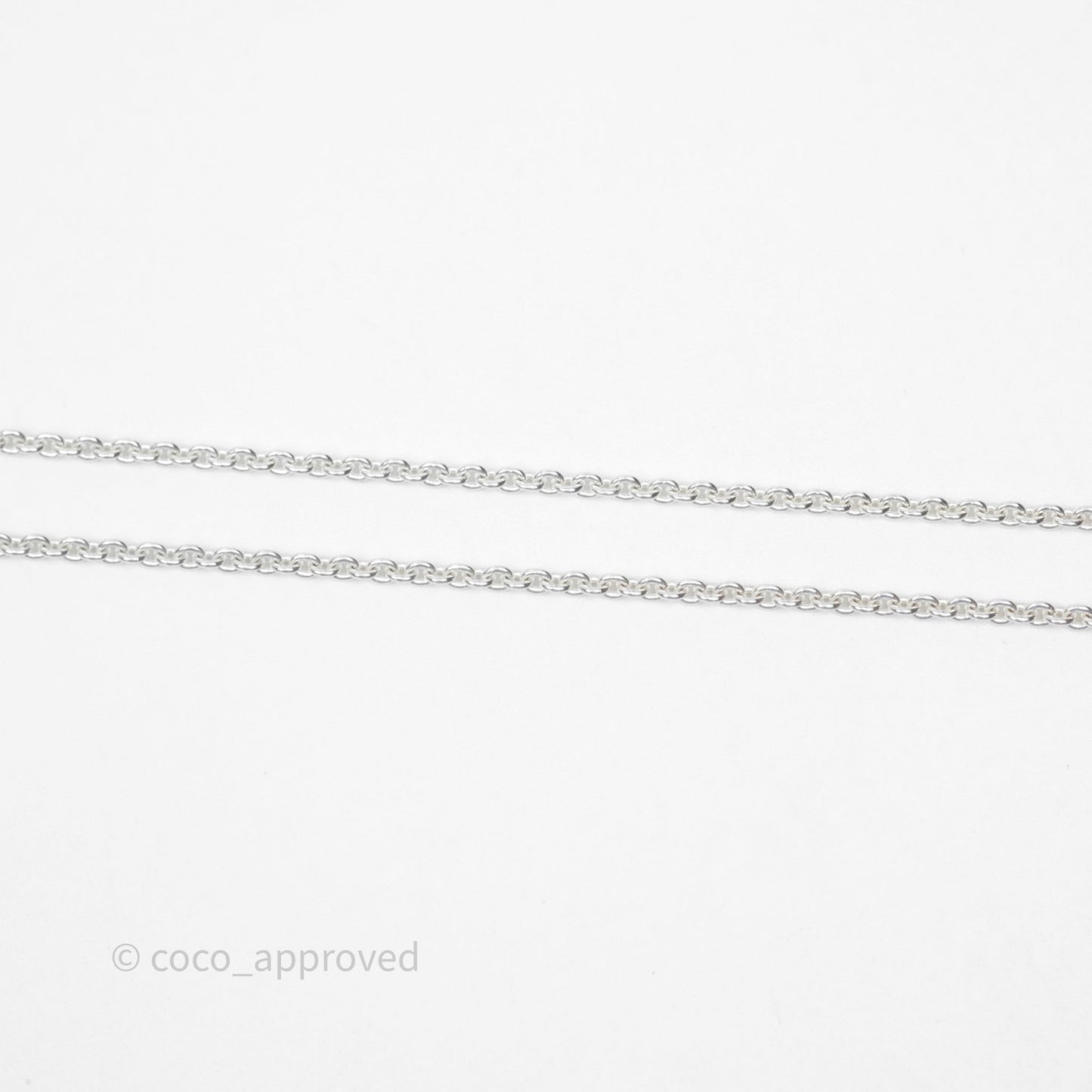 Hermès Amulettes Kelly Pendant in Sterling Silver