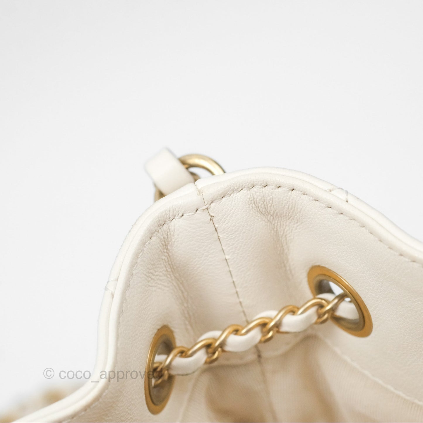 Chanel Quilted Drawstring Bucket Bag Ivory Lambskin Aged Gold Hardware