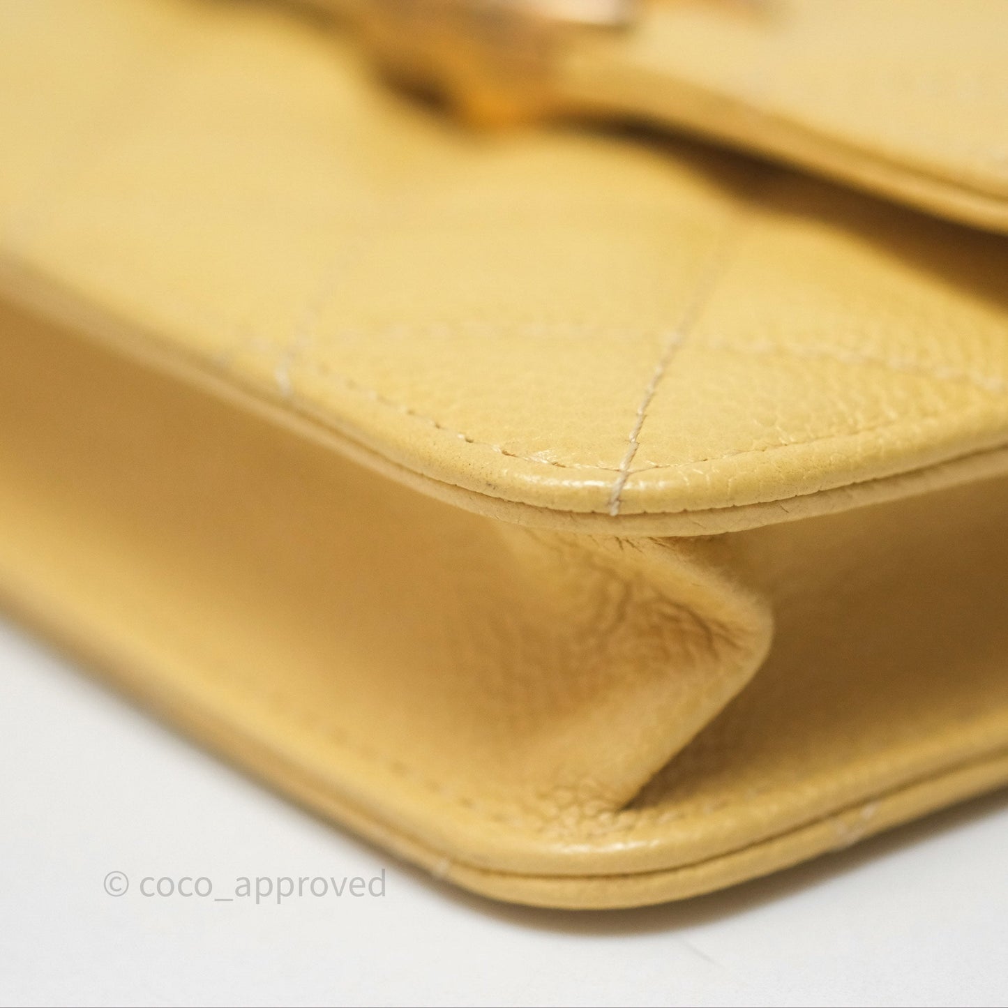 Chanel Mini Clutch With Chain Yellow Caviar Aged Gold Hardware