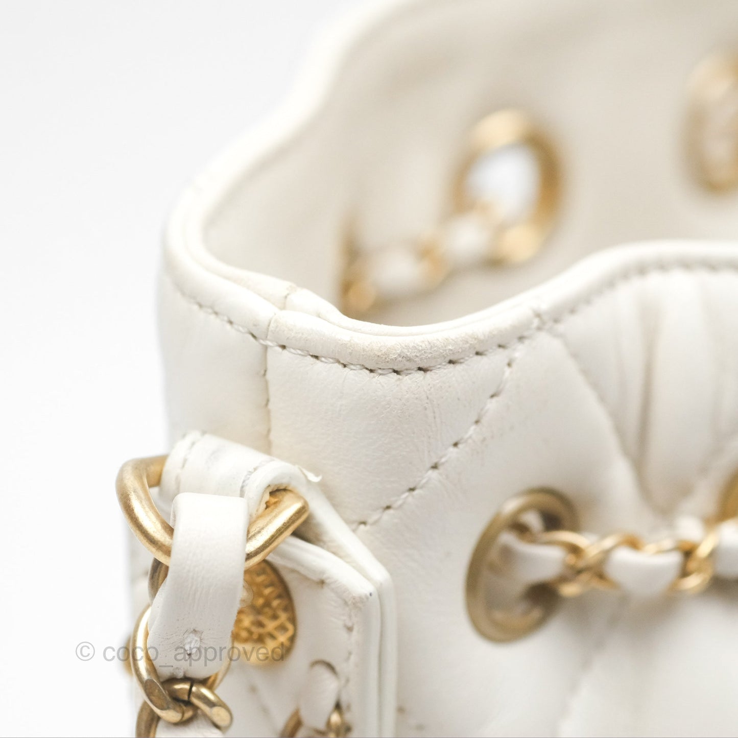 Chanel Quilted Drawstring Bucket Bag Ivory Lambskin Aged Gold Hardware