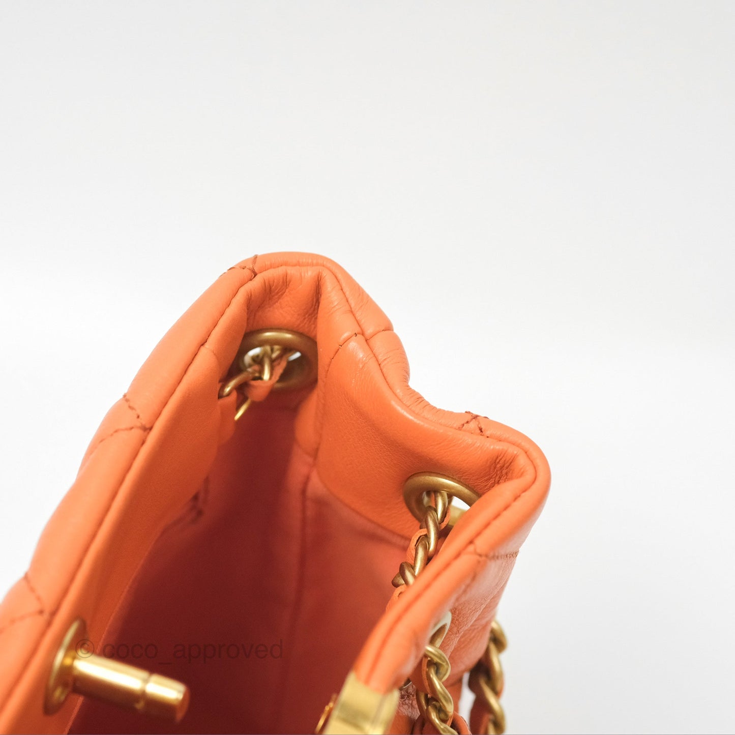 Chanel Small Drawstring Backpack Orange Calfskin Aged Gold Hardware 23A
